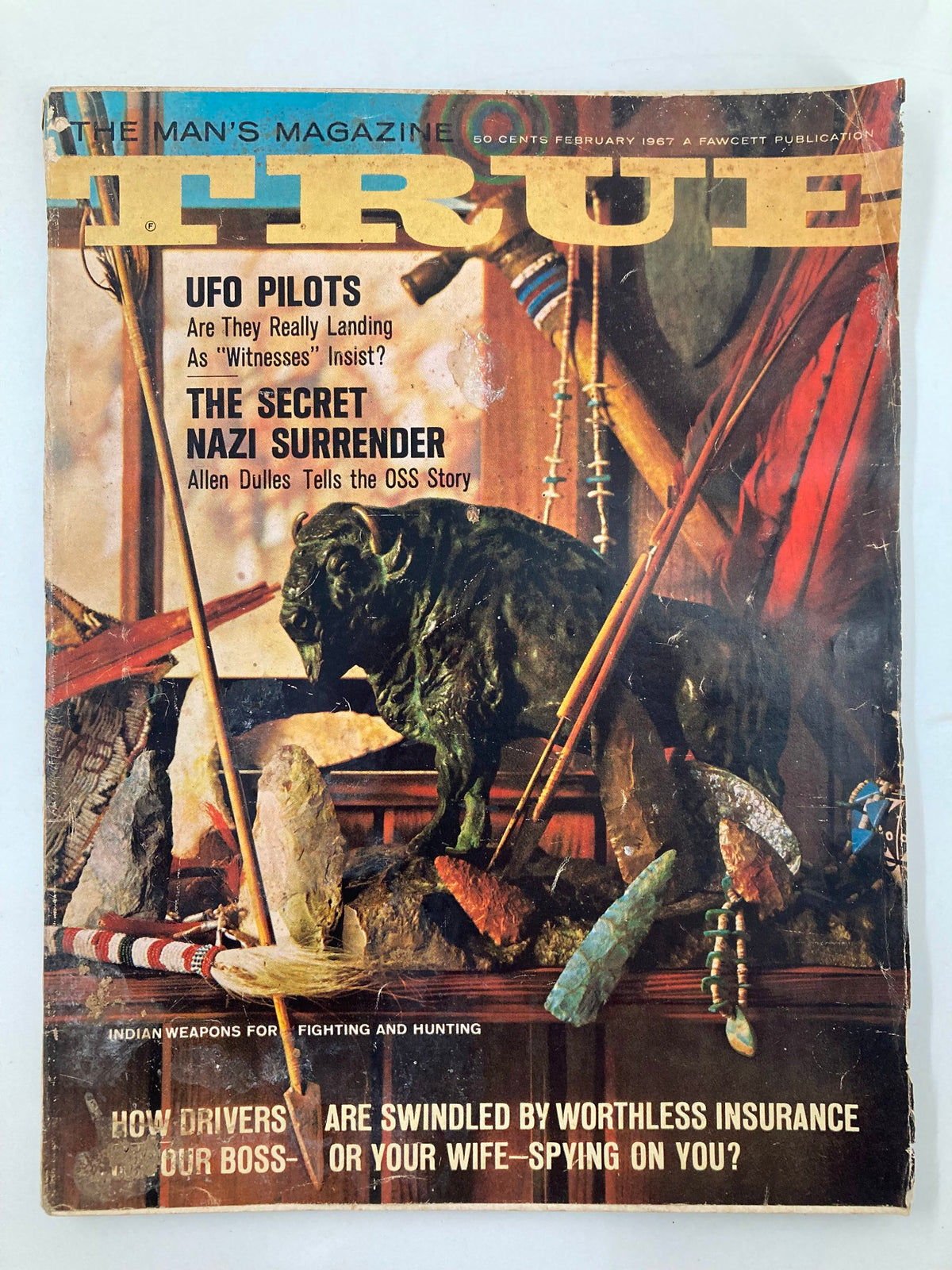 Cover of TRUE The Man's Magazine February 1967 featuring an article on Indian Weapons for Fighting, showcasing various historical artifacts and colorful illustrations.