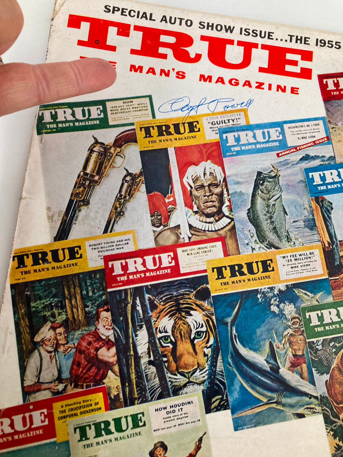 Cover of TRUE The Man's Magazine January 1955, featuring various illustrated covers, including a tiger and underwater scene, showcasing vintage style and design.