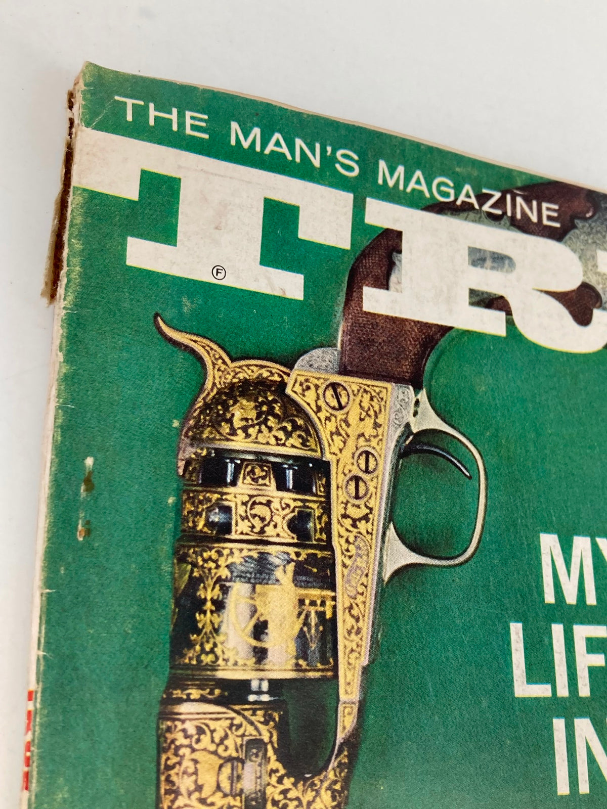 Close-up of the cover of TRUE The Man's Magazine July 1962, highlighting the title and decorative pistol, illustrating My Life In Court by Louis Nizer.