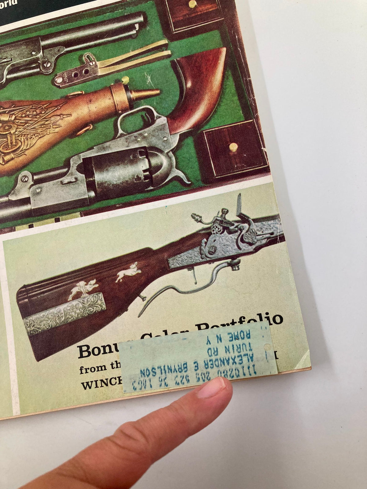 Close-up of the cover details from TRUE The Man's Magazine June 1961 showcasing the firearms and a price label, highlighting the magazine's collectible nature.