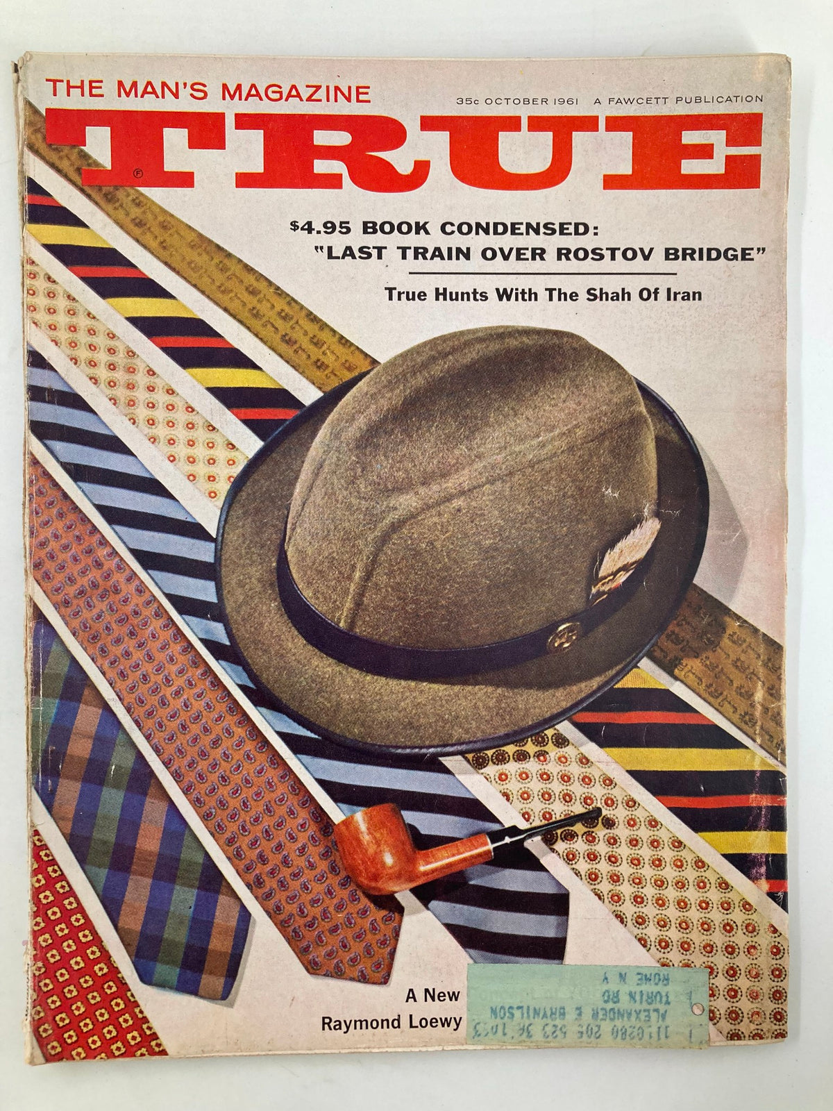 Cover of TRUE The Man's Magazine, October 1961, featuring the article 'Last Train Over Rostov Bridge' with a vintage hat, pipe, and ties in bold colors.