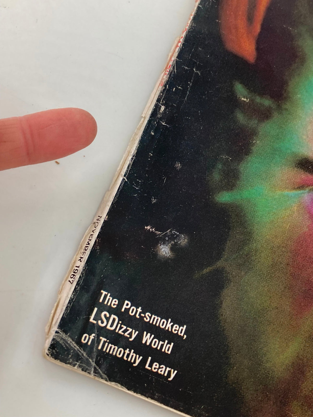 Close-up of the cover of TRUE The Man's Magazine November 1967, highlighting the text 'The Pot-smoked, LSDizzy World of Timothy Leary' along with the magazine's date and minor wear.