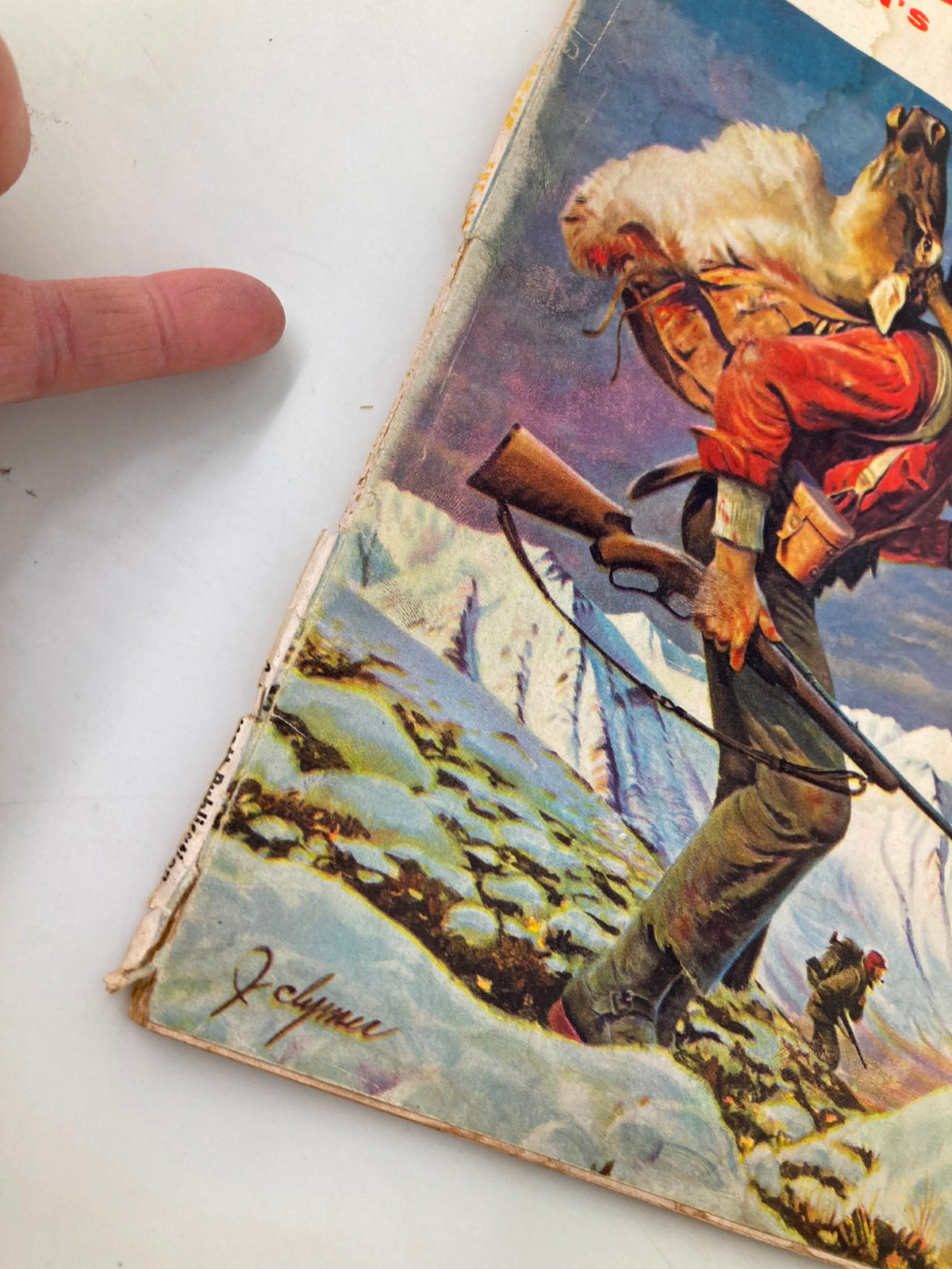 Detail view of the spine and iconic illustration from TRUE The Man's Magazine March 1956, depicting a rugged outdoor scene.