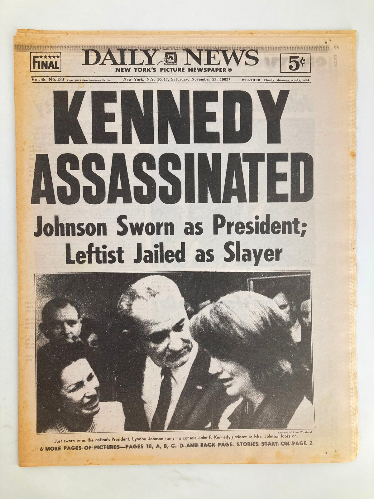 November 23, 1963 edition of the Daily News newspaper highlighting the assassination of Kennedy and the swearing-in of Lyndon Johnson as President.