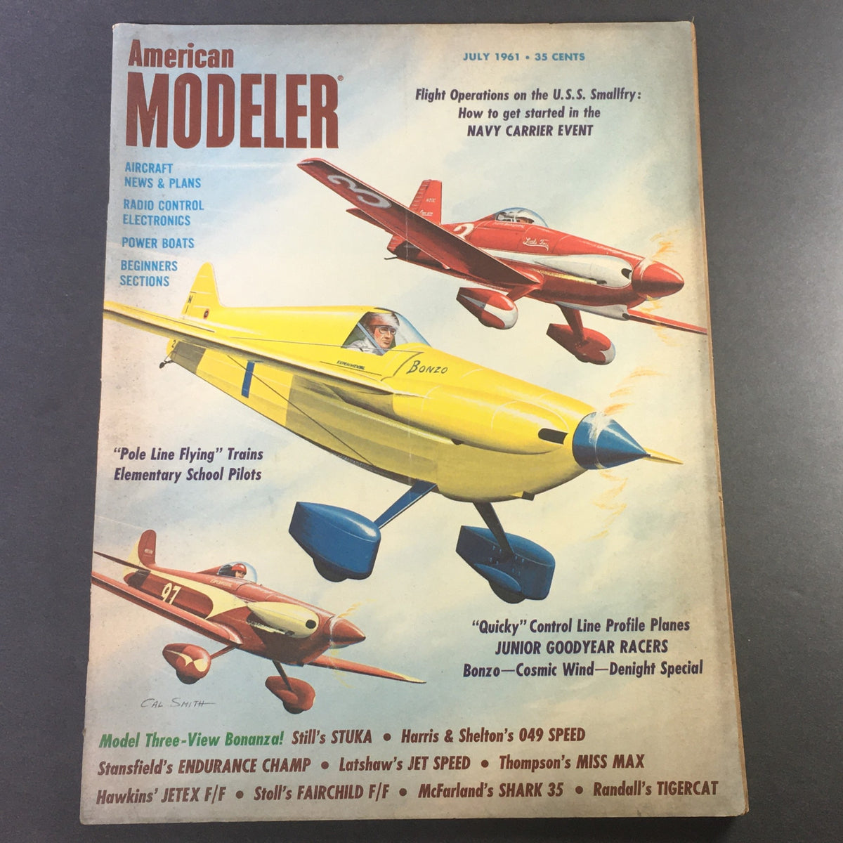 Cover of VTG American Modeler July 1961 magazine featuring Flight Operations U.S.S. Smallfry Navy Carrier, showcasing colorful model airplanes and aviation-related articles.