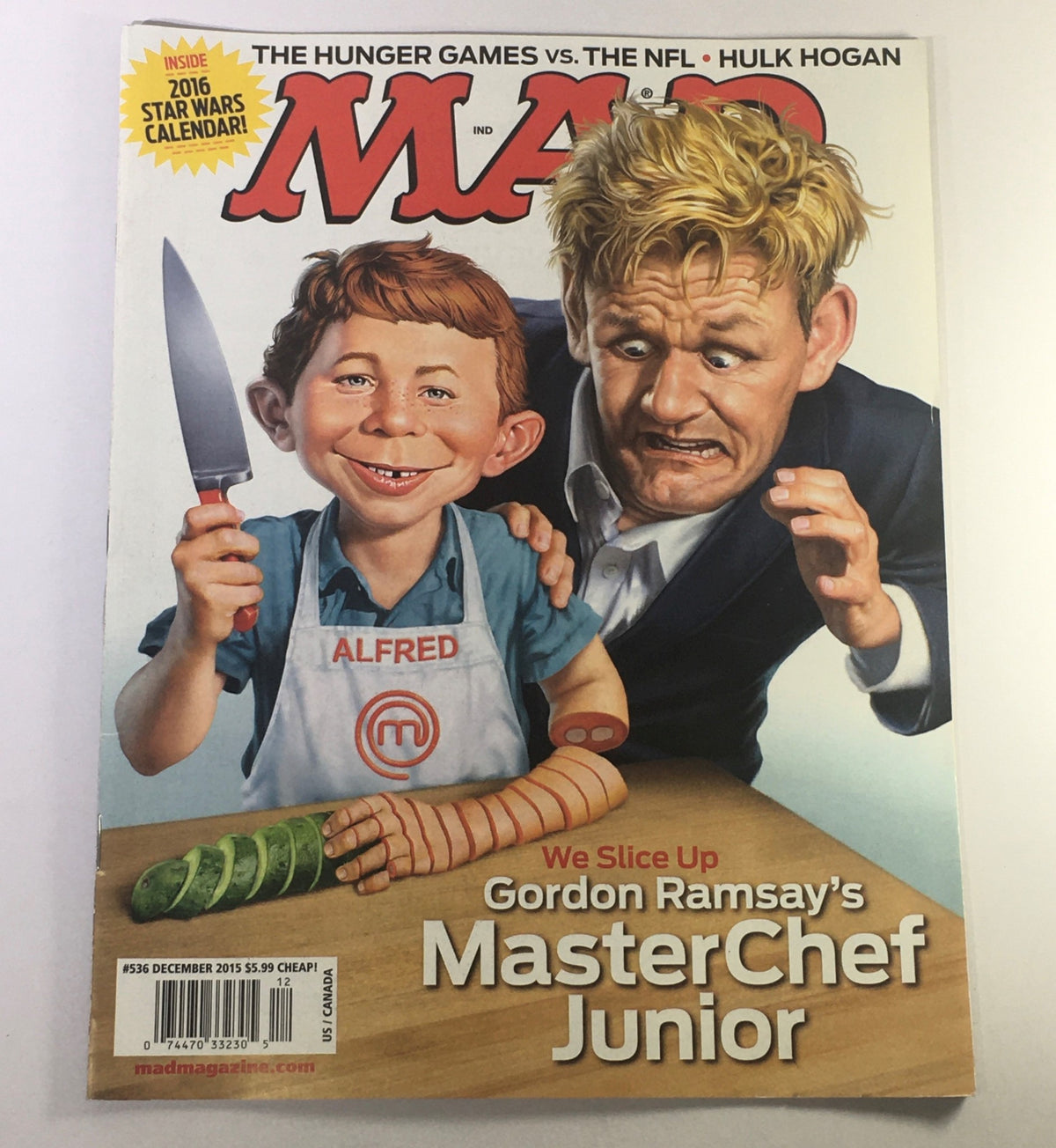 Cover of MAD Magazine December 2015 featuring Chef Gordon Ramsay and MasterChef Junior. Includes character Alfred with a knife and Gordon Ramsay holding a knife in a humorous illustration. Title: MAD Magazine December 2015 - Chef Gordon Ramsay's MasterChef Junior / Hulk Hogan.