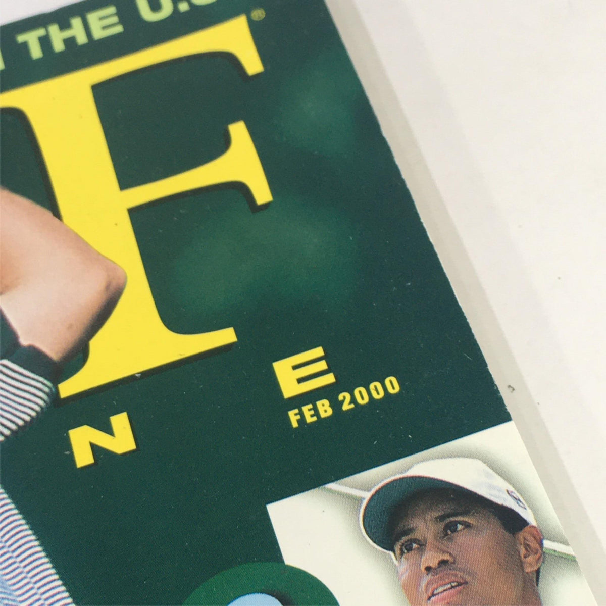 Close-up of the Golf Magazine February 2000 logo, highlighting the date and featuring a partial image of Tiger Woods.