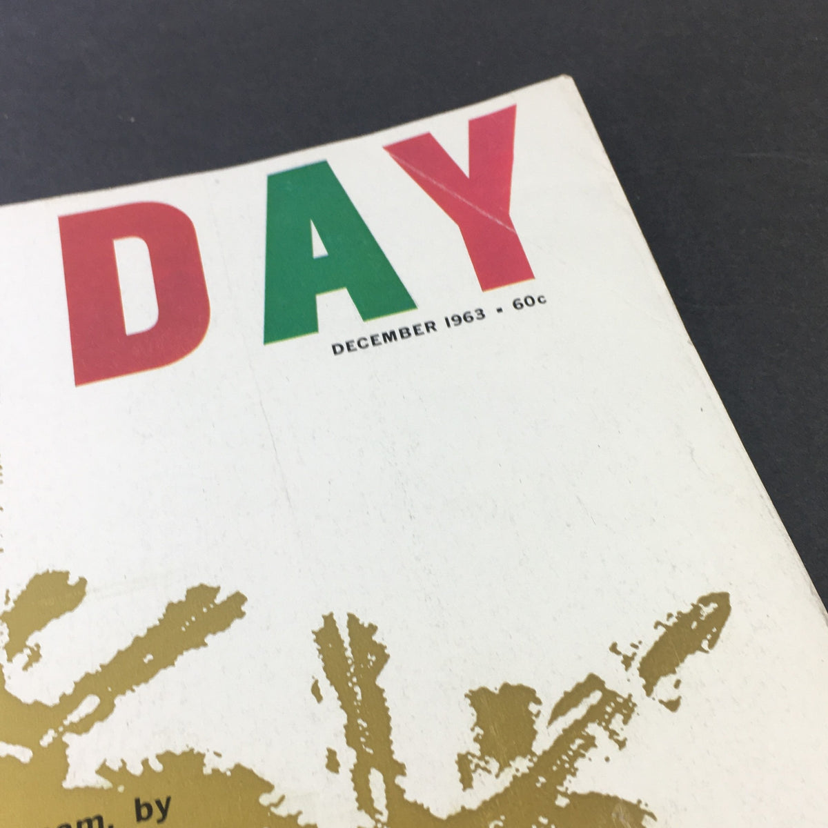 Close-up view of the title on the cover of VTG Holiday Magazine December 1963, highlighting the month and year along with the magazine's theme.