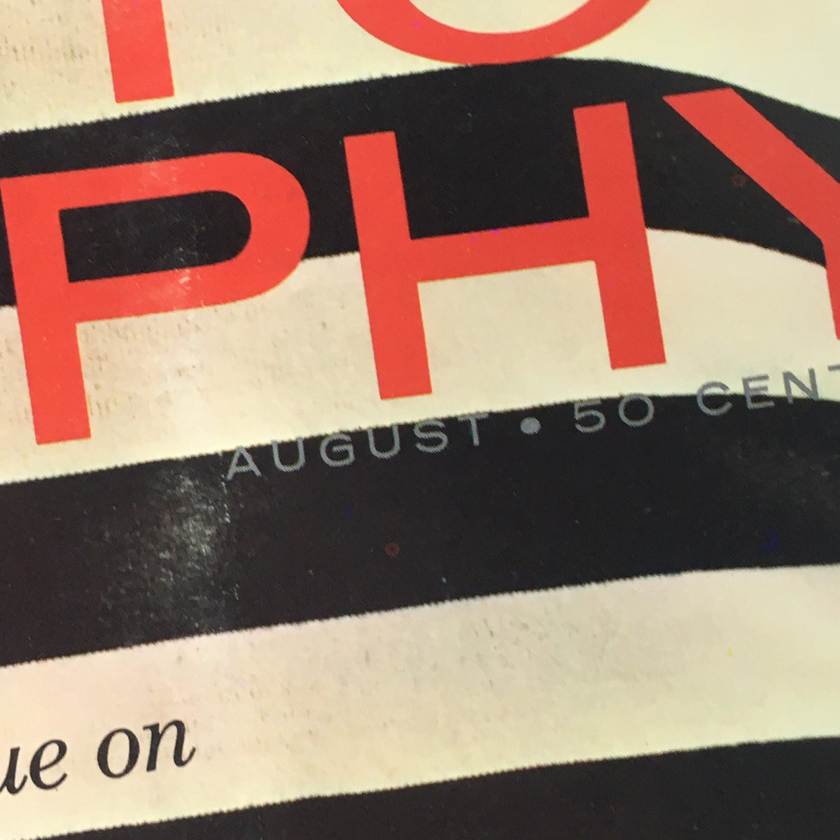 Close-up of the title section of Popular Photography Magazine August 1963, emphasizing the magazine's focus on small cameras and photographic innovation.