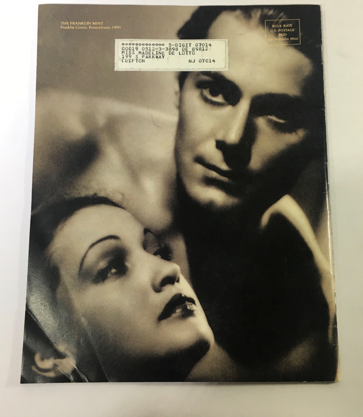 Cover image of VTG Franklin Mint's Almanac November December 1988 featuring Hollywood icons Robert Taylor and an unidentified actress, showcasing vintage photography.