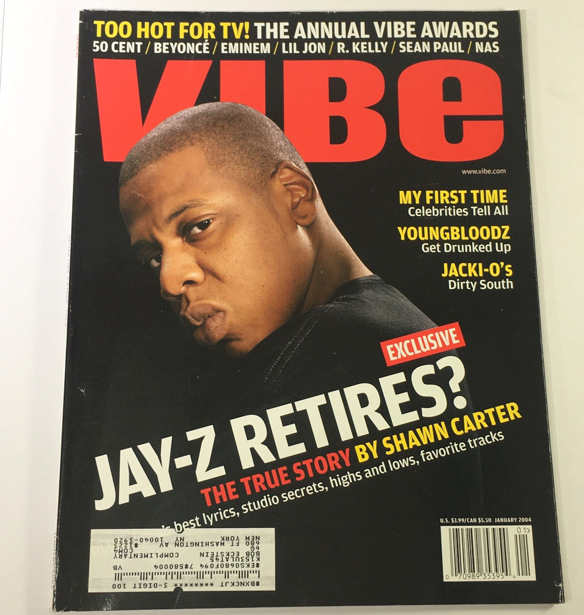 Cover of Vibe Magazine January 2004 featuring Jay-Z with the headline 'Jay-Z Retires?' by Shawn Carter, alongside iconic artists Beyoncé and Eminem. This issue captures the essence of early 2000s hip-hop culture.