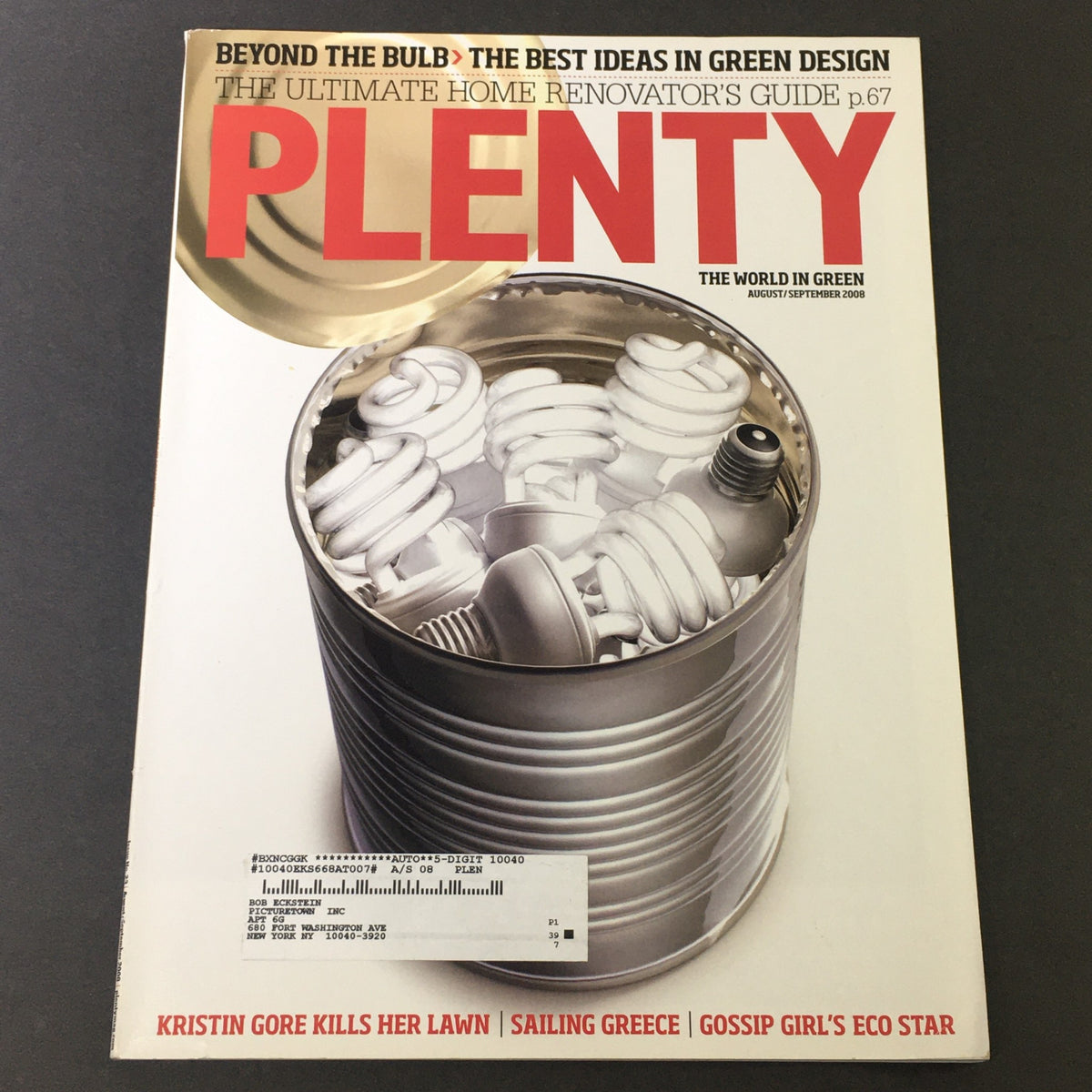 Cover of Plenty The World in Green August September 2008 featuring an image of energy-efficient light bulbs and information about home renovation. Includes a focus on Sailing Greece and an article by Kristin Gore.