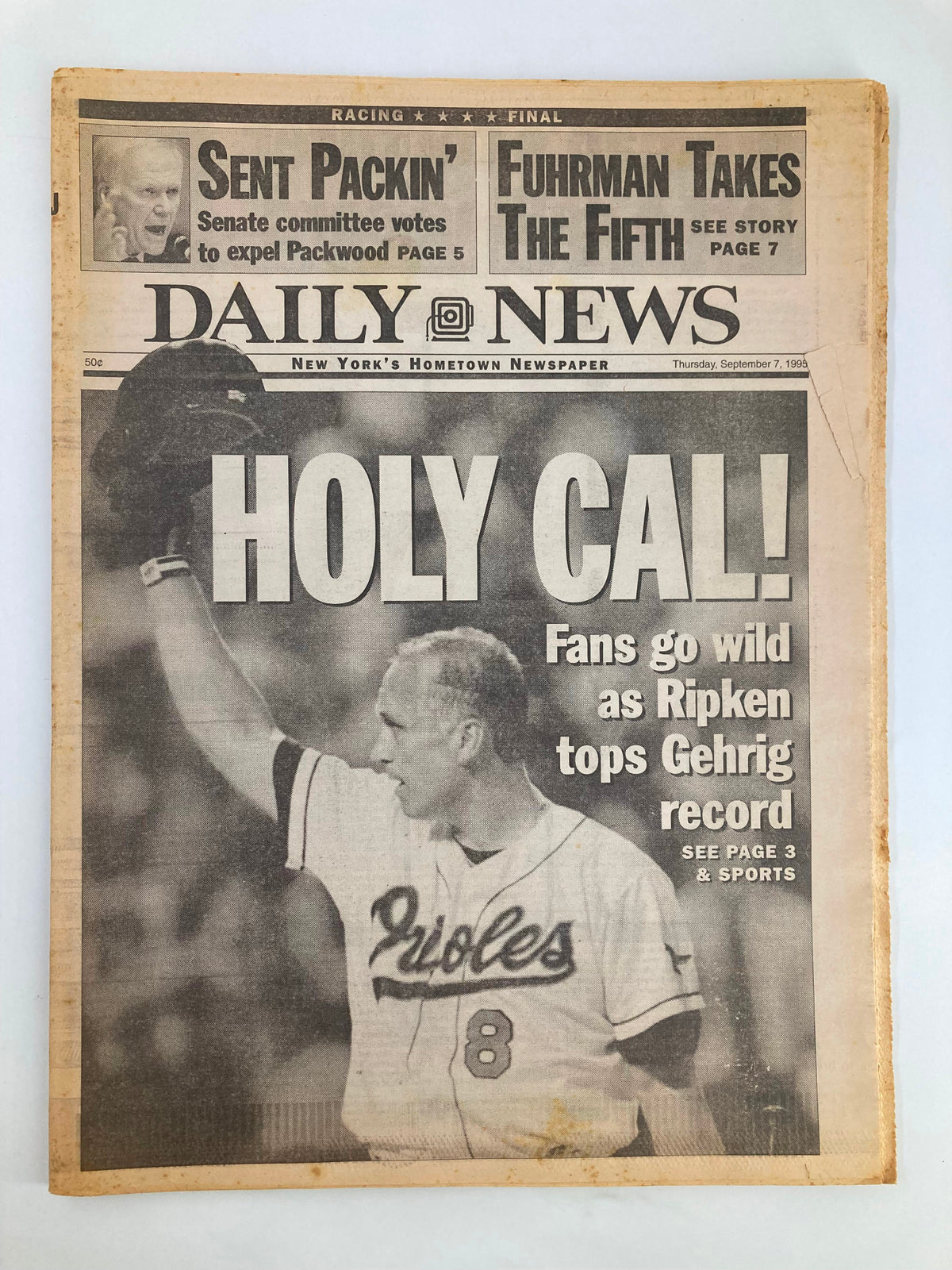 VTG Daily News Newspaper from September 7, 1995 featuring Cal Ripken titled 'HOLY CAL!' highlighting fans celebrating as Ripken tops Gehrig's record.