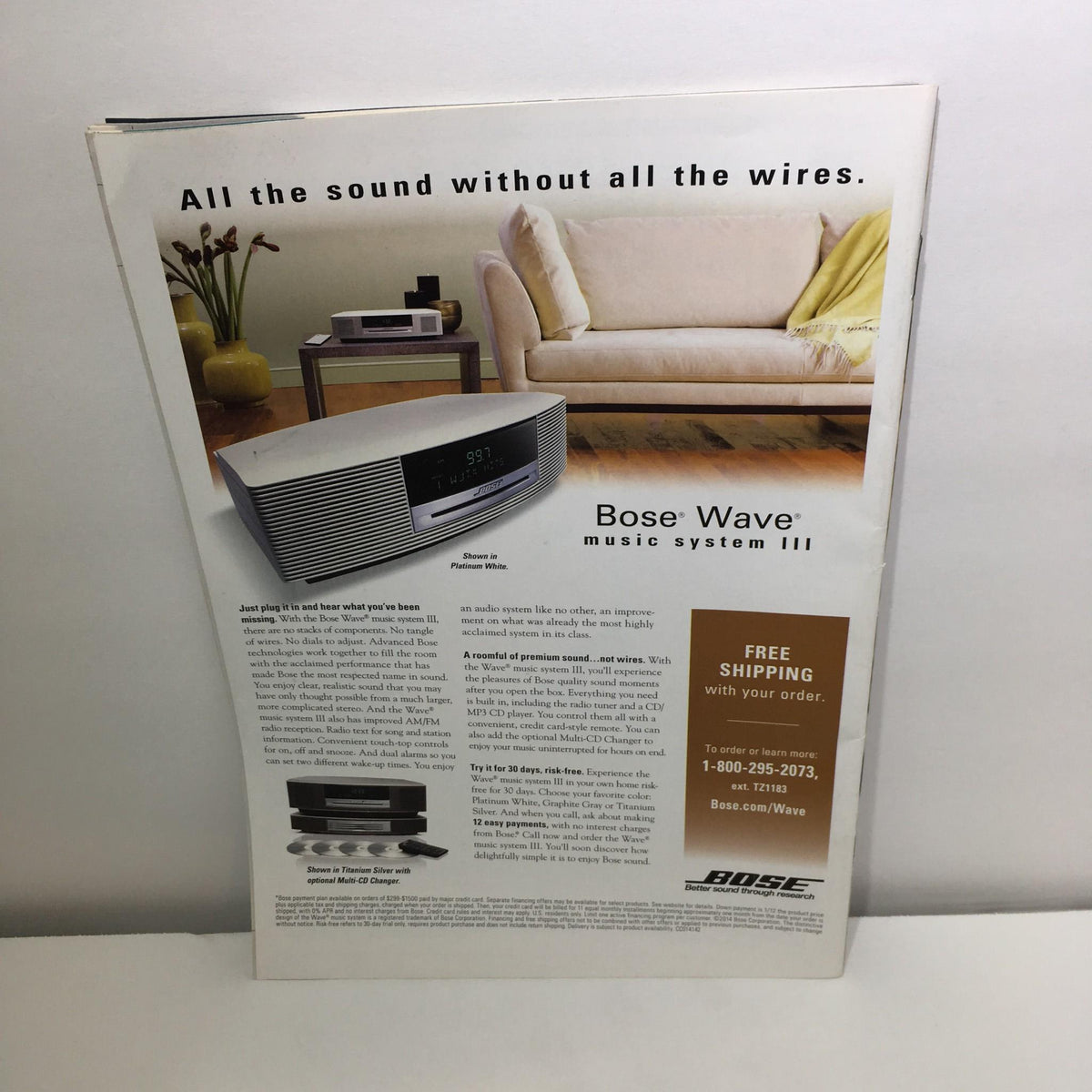 Advertisement page in TV Guide April 7-20 2014 Double Issue, featuring the Bose Wave music system III, complementing the magazine's content.