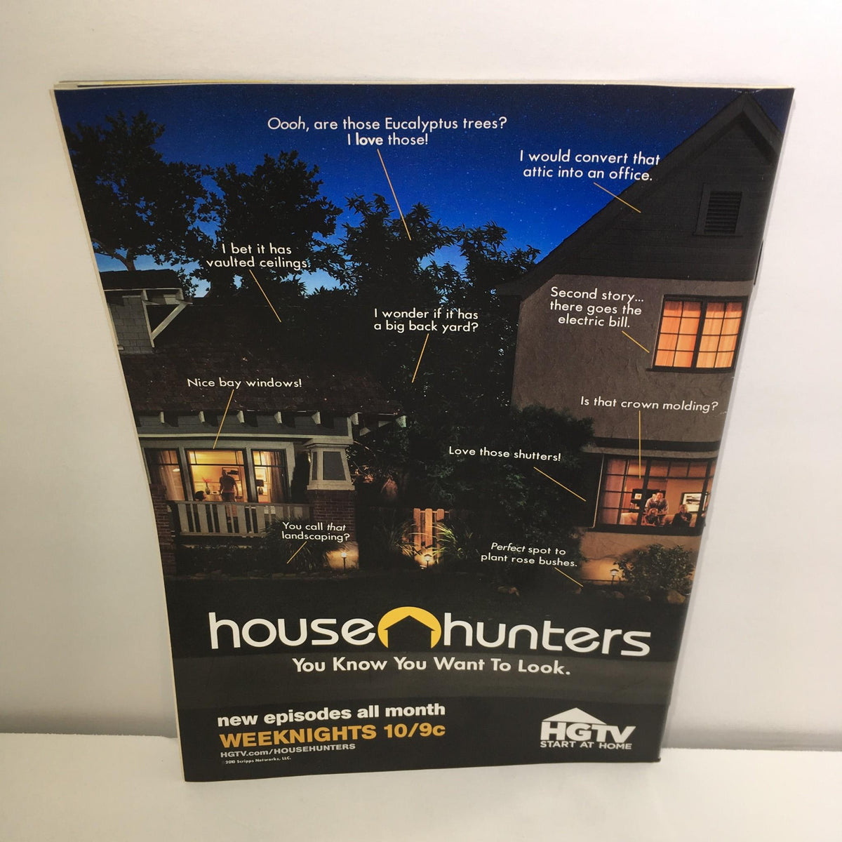 House Hunters magazine cover featuring a night scene with illuminated homes, highlighting features like a bedroom with vaulted ceilings, a backyard, and more, promoting HGTV's real estate show. TV Guide Sept 13-19 2010 Fall Preview.