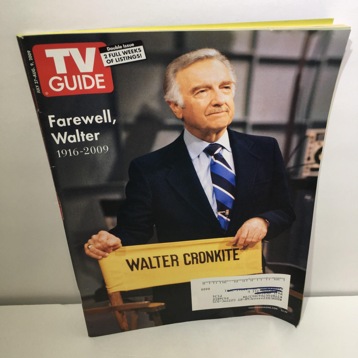 TV Guide covering farewell tribute to Walter Cronkite, featuring him holding a sign, dated July 27-Aug 9, 2009.