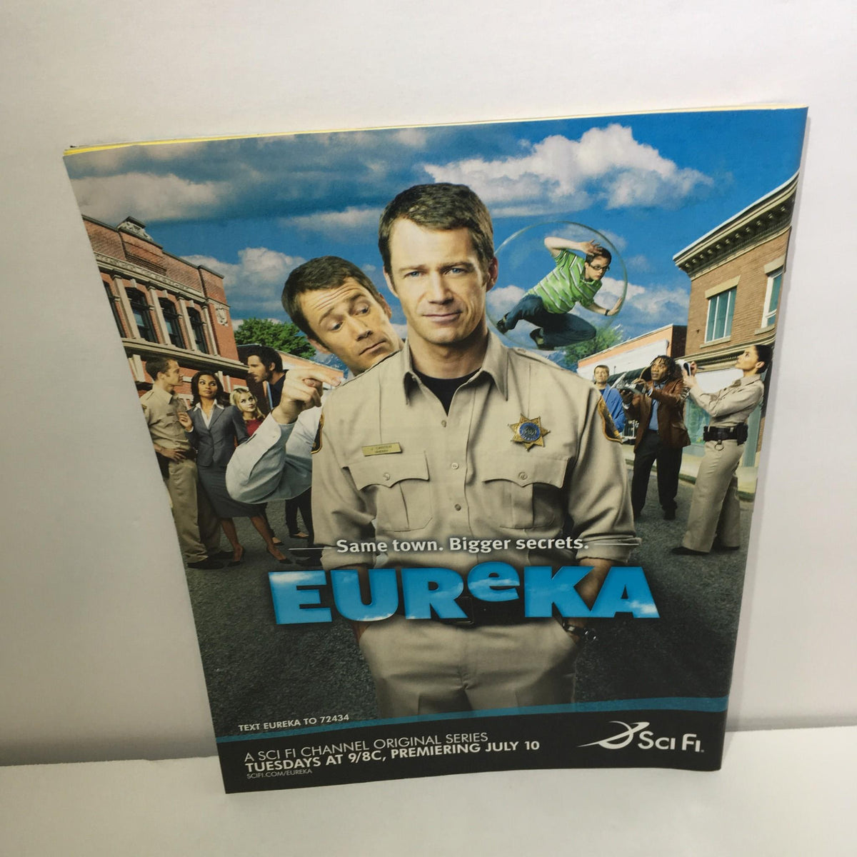 Promotional page for the TV show Eureka featured in TV Guide July 9-15 2007, showcasing the main characters.