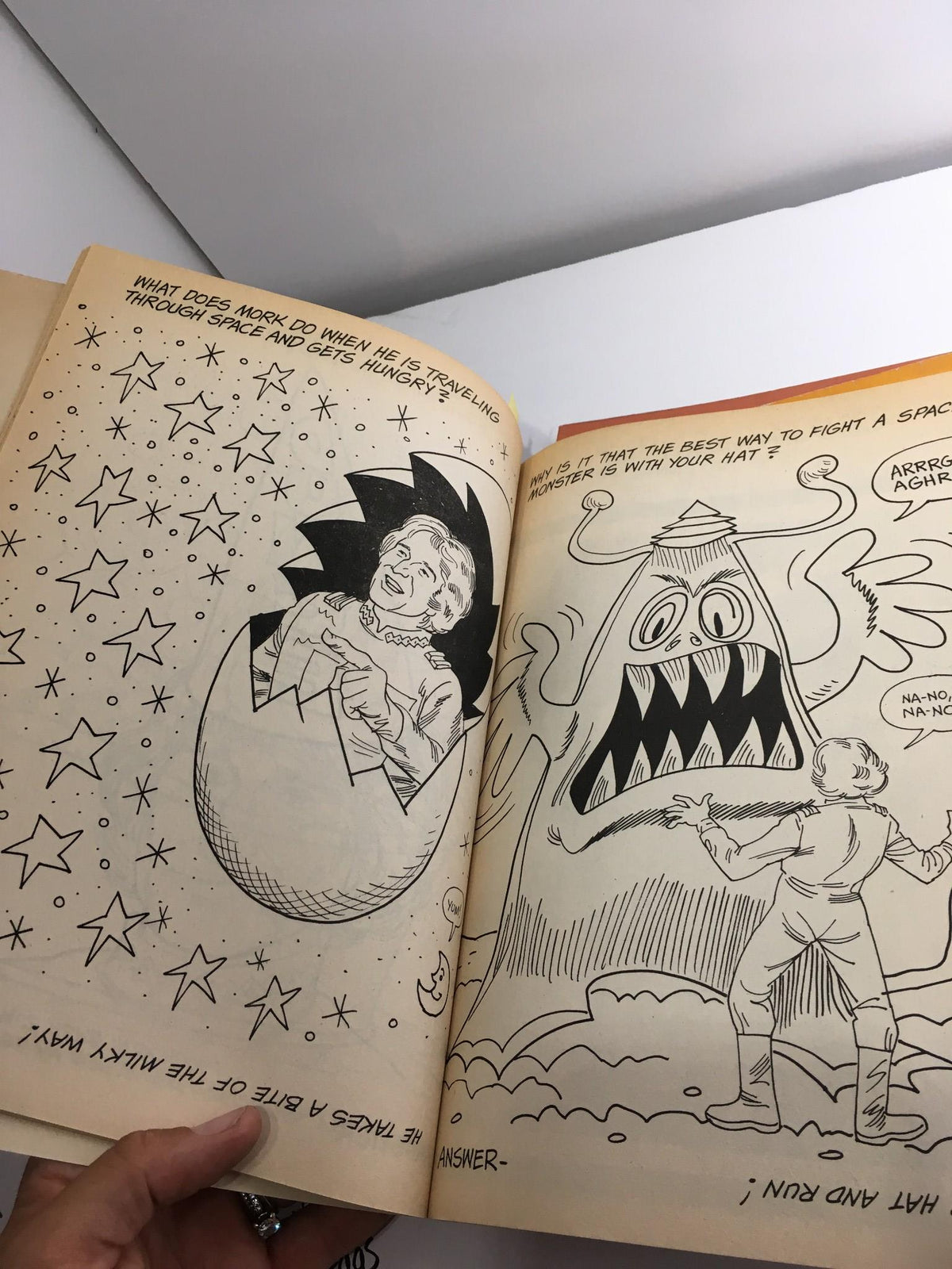 Interior page of The Mork & Mindy Activity Book featuring a fun activity with characters and a question prompt.