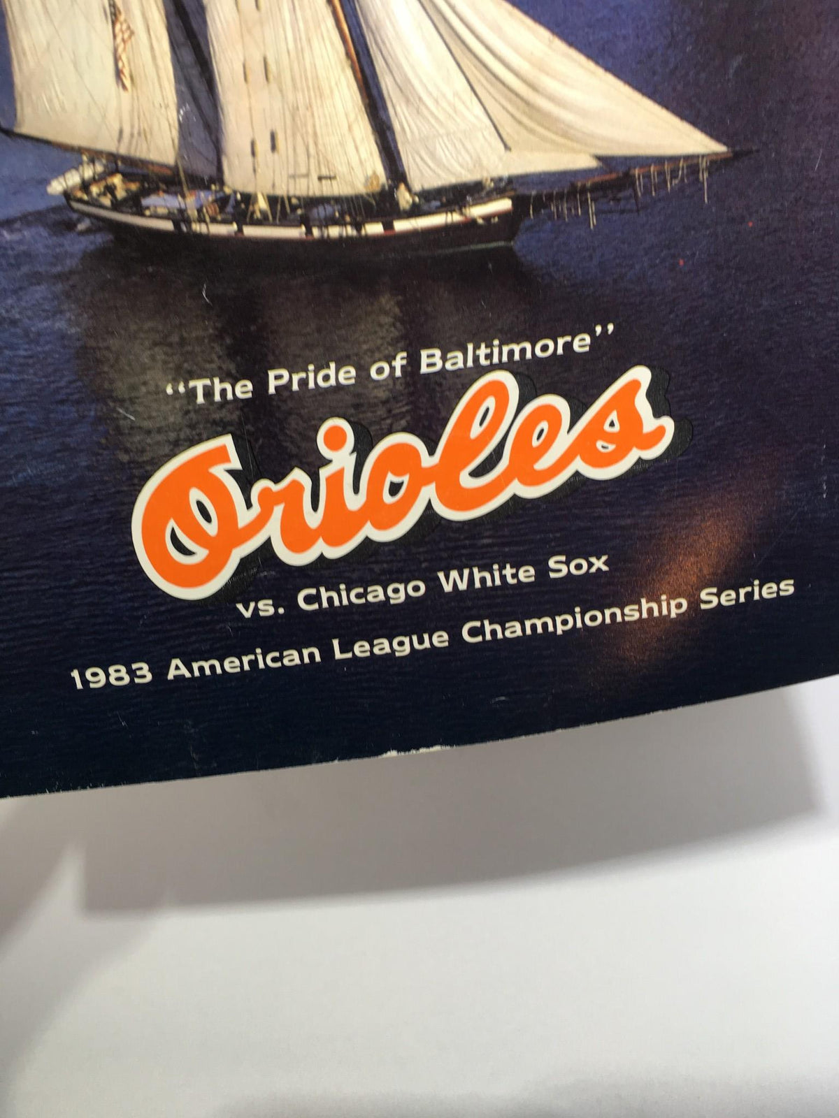 Close-up image of the title section from the 1983 ALCS program, 'The Pride of Baltimore Orioles VS Chicago White Sox', highlighting the team names and championship series.