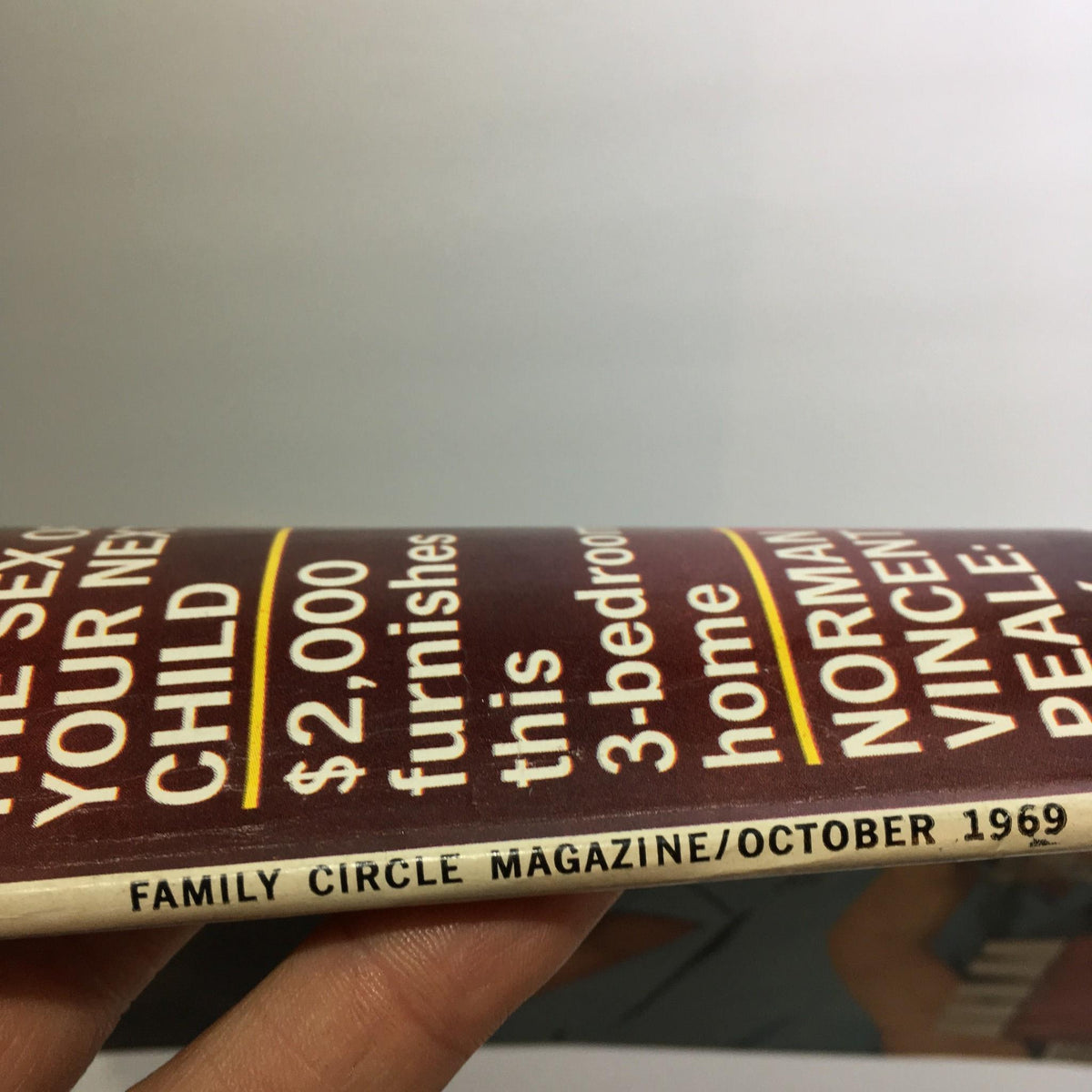 Side view showing the spine of the Family Circle Magazine October 1969, emphasizing its vintage publishing date.