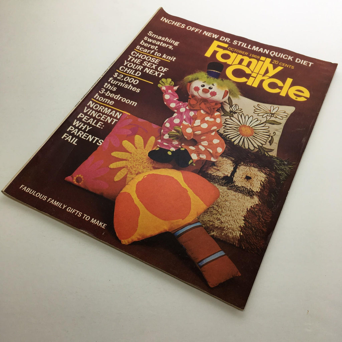 Another view of the cover of Family Circle Magazine October 1969 showing a clown doll and floral pattern cushions, promoting the Dr. Stillman Quick Diet.