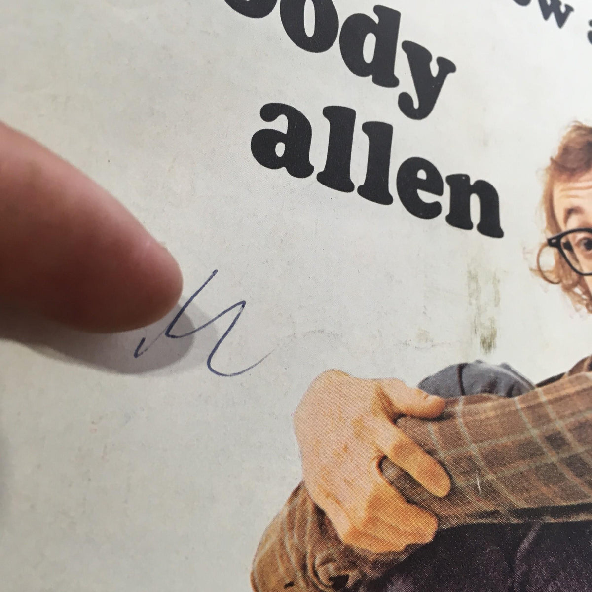 Close-up detail of a vintage Time Magazine cover featuring Woody Allen from July 3, 1972, showing a handwritten note on the cover.