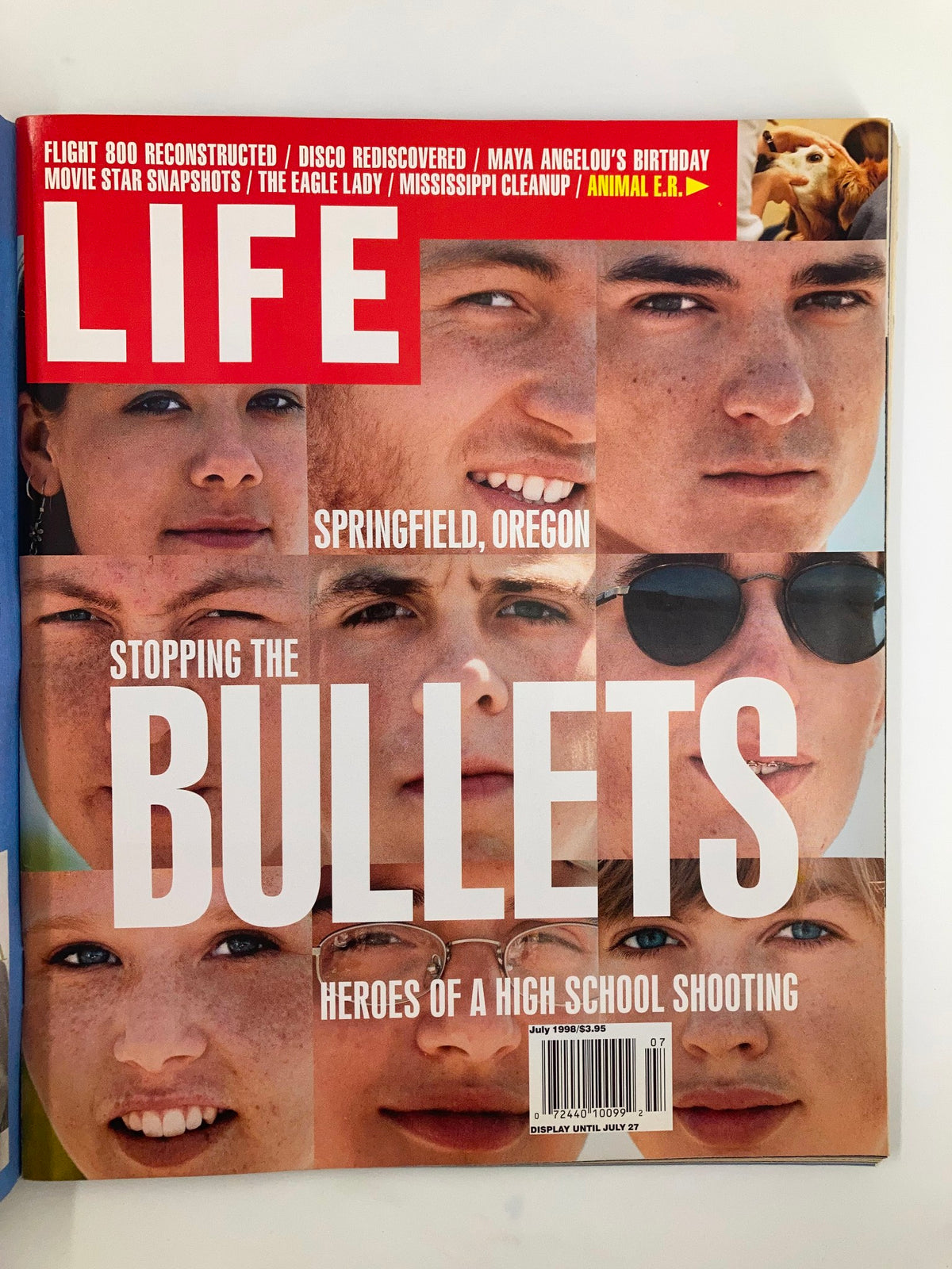 Life Magazine July 1998 issue featuring the cover story 'Stopping Bullets: Heroes of Highschool Shooting' showcasing the faces of young individuals. This vintage collectible explores themes of bravery and resilience in the context of school violence.