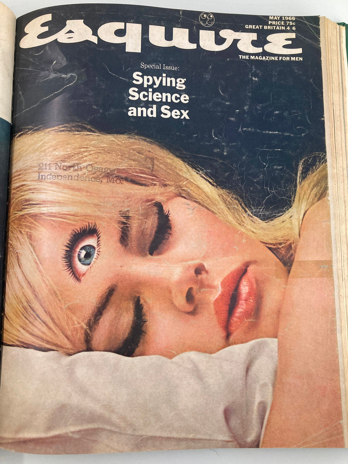 Cover of VTG Esquire Magazine January - June 1966 presenting a surreal image of a woman with an additional eye, encapsulating themes of spying and science.