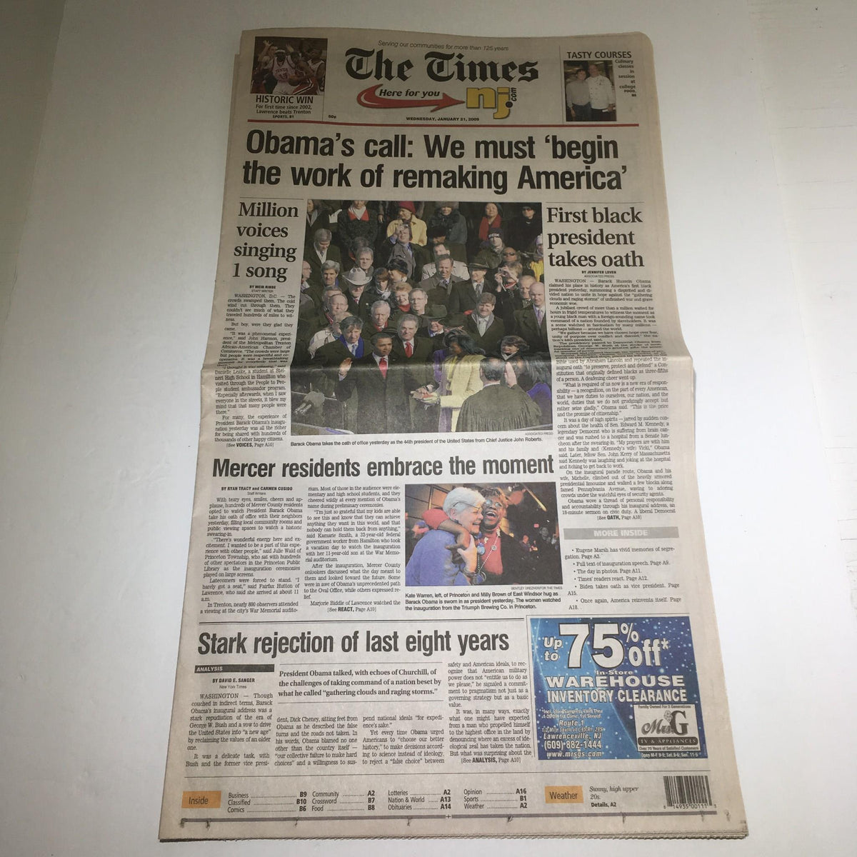A historical newspaper titled 'The Times: 01/21/09 Obama's Call Must Begin The Work of Remarking America,' featuring coverage of President Obama's inauguration, with images of the moment and the crowd. This edition captures a pivotal moment in American history.