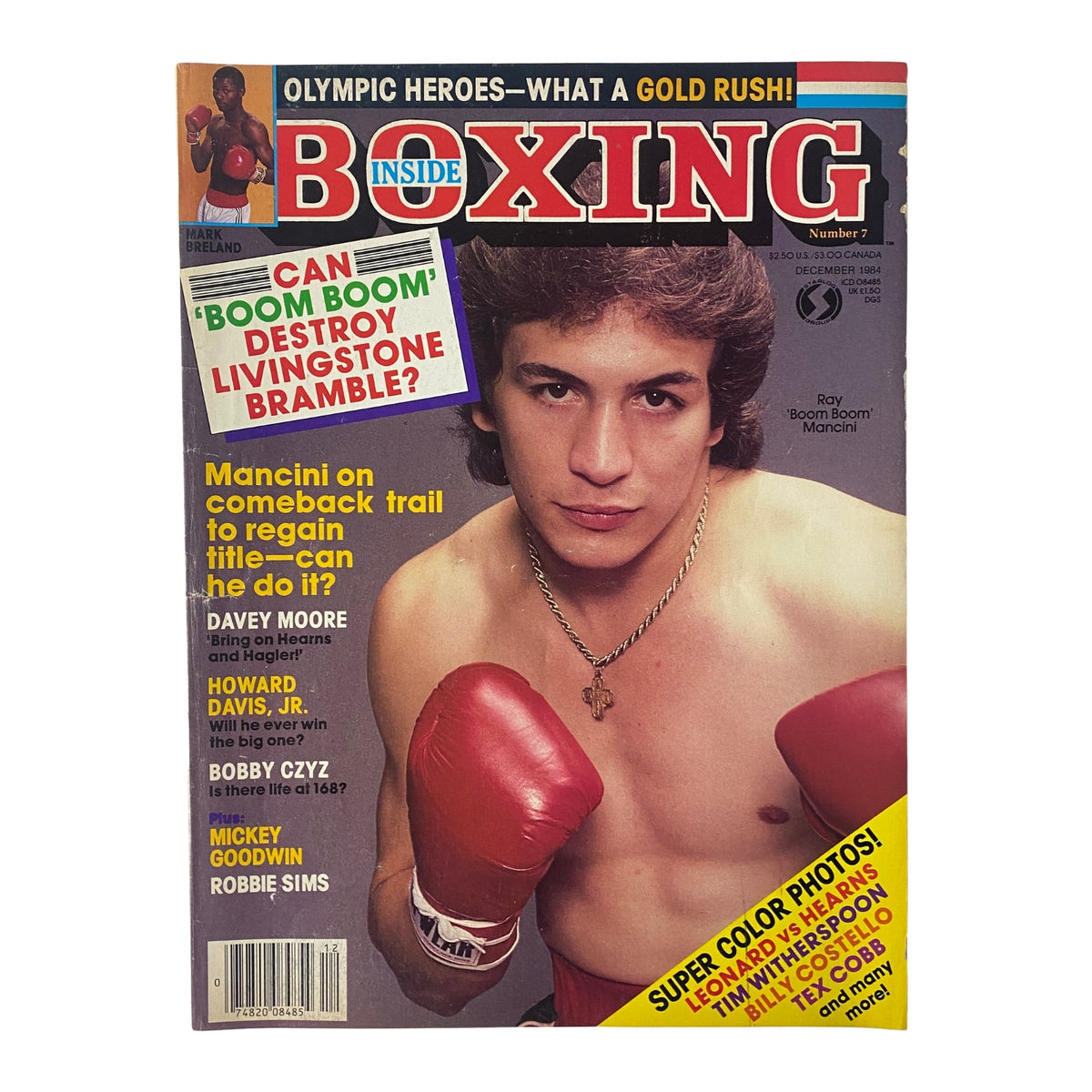 Inside Boxing Magazine December 1984, No. 7 featuring Ray Boom Boom Mancini on the cover, showcasing articles and images related to boxing and its rising stars.