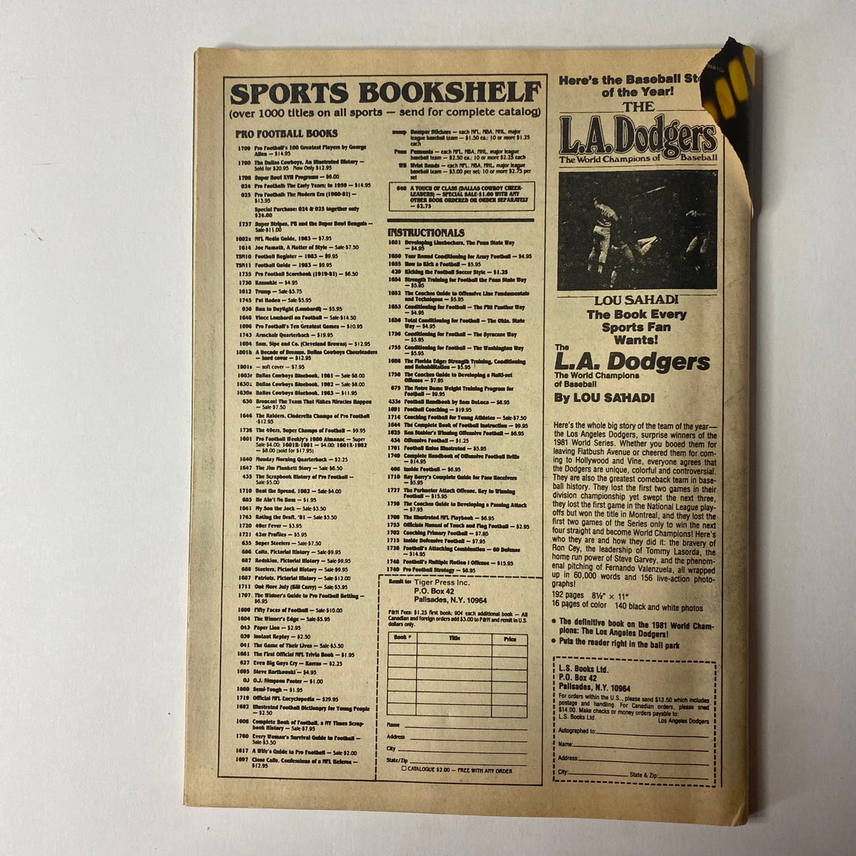 Back cover of Boxing Scene Magazine June 1986 displaying sports books catalog with information about various sports titles and a promotional item for the L.A. Dodgers.