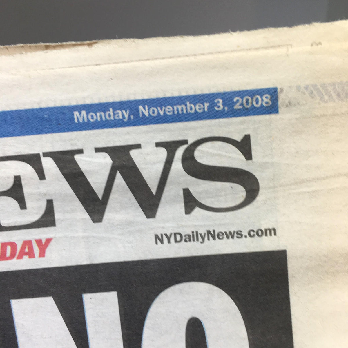 Close-up of the NY Daily News issue date, Monday, November 3, 2008, above the headline featuring Barack Obama.