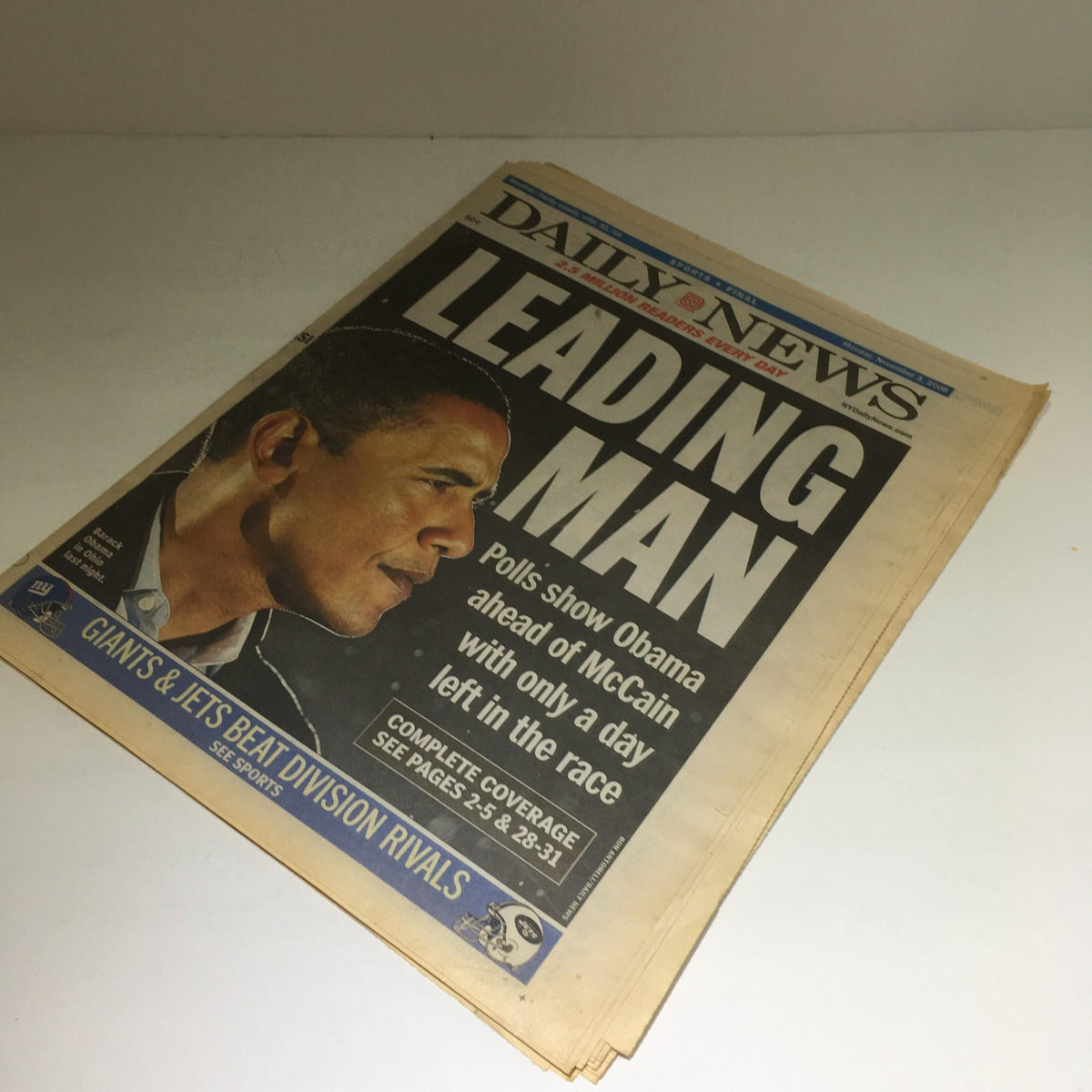 NY Daily News front page titled 'Leading Man,' showcasing Barack Obama with caption about polls showing him ahead of McCain in the presidential race.