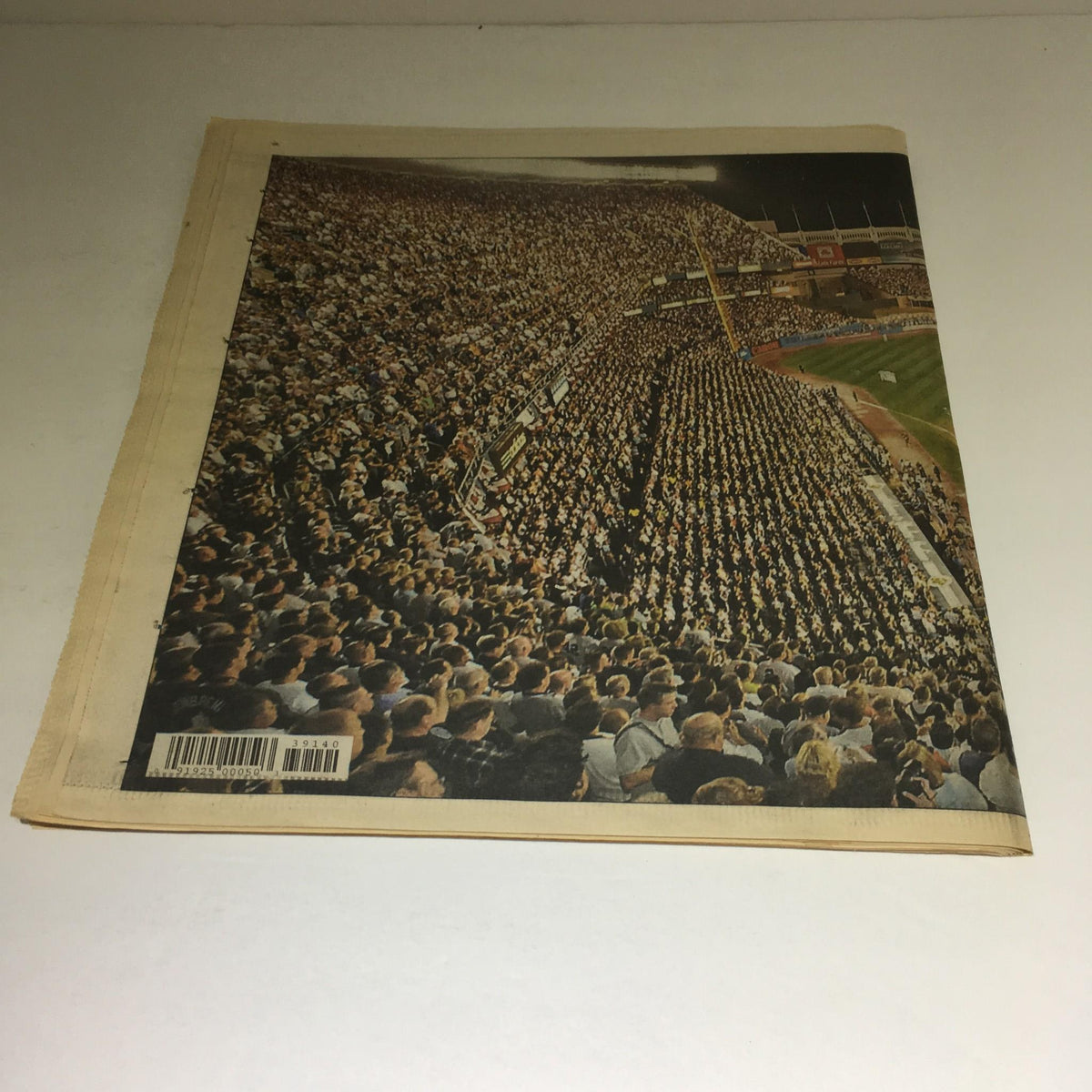 Crowd-filled stadium captured in the magazine 'New York Post: Sept 22, 2008 Last Night at the Stadium', showcasing the vibrant atmosphere at the iconic venue during its final events.