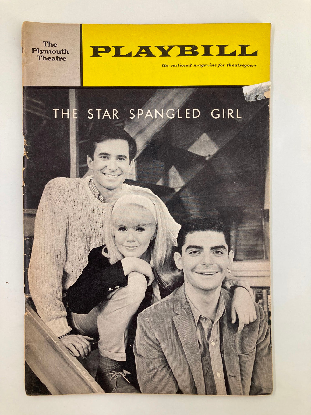 1967 Playbill for The Plymouth Theatre featuring Anthony Perkins in The Star-Spangled Girl, showcasing the cast on the cover.