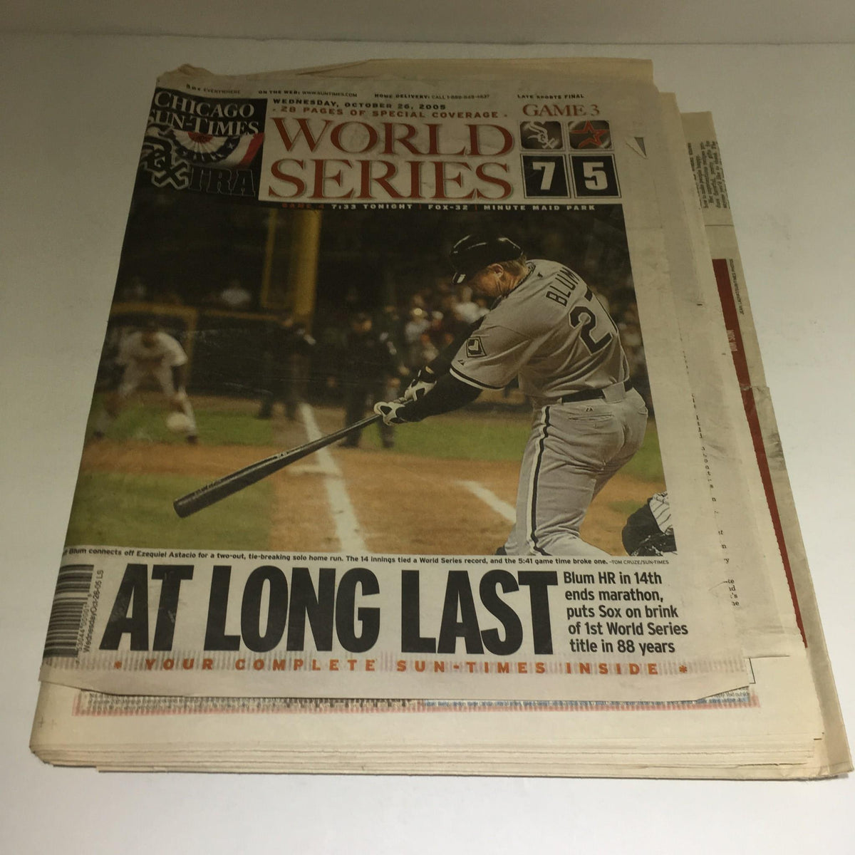 Chicago Sun-Times: Oct 26, 2005 edition titled 'At Long Last,' featuring a cover with a baseball player swinging a bat and headlines about the World Series.