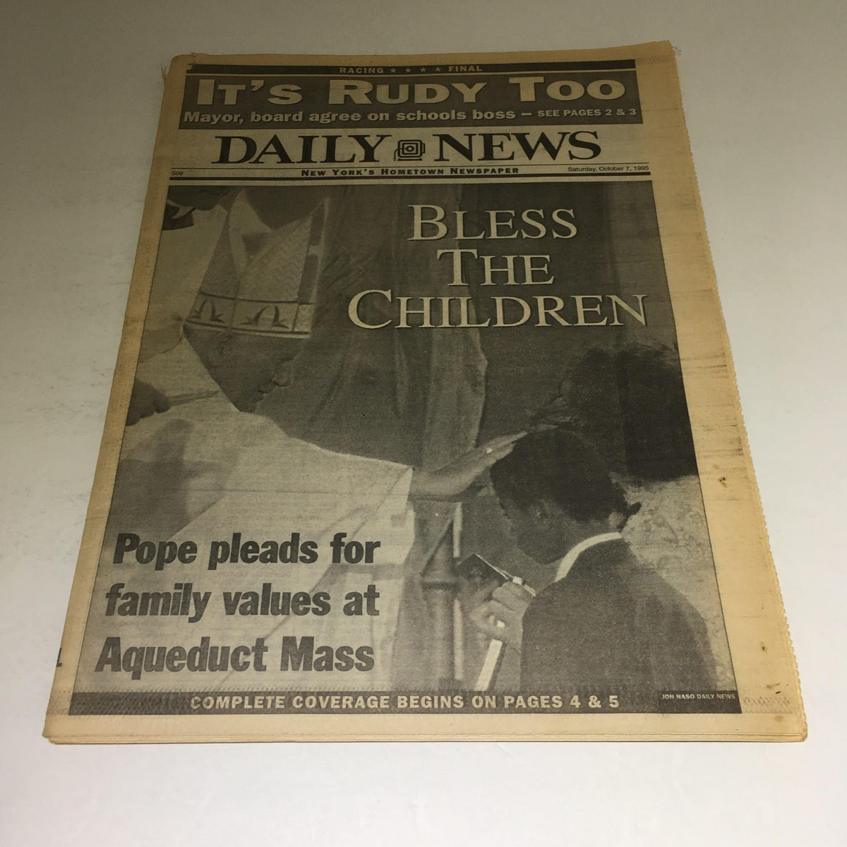 NY Daily News front page from October 7, 1995, featuring the headline 'Bless The Children' and coverage of Pope's plea for family values at Aqueduct Mass.