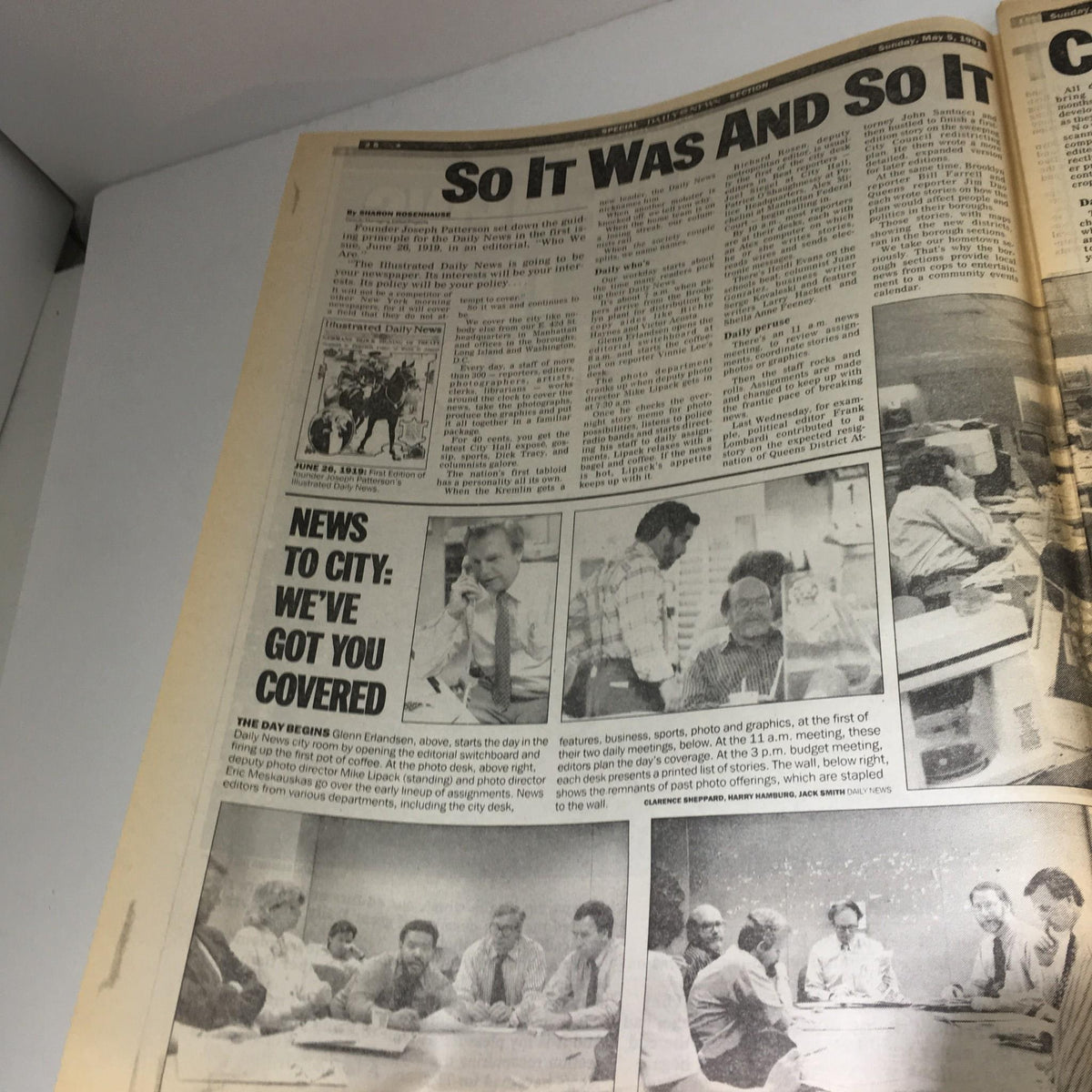 An interior page of the New York Daily News from May 5, 1991, titled 'So It Was And So It,' featuring articles and photographs that depict the newsroom environment. The page highlights the daily operations and coverage of the paper.