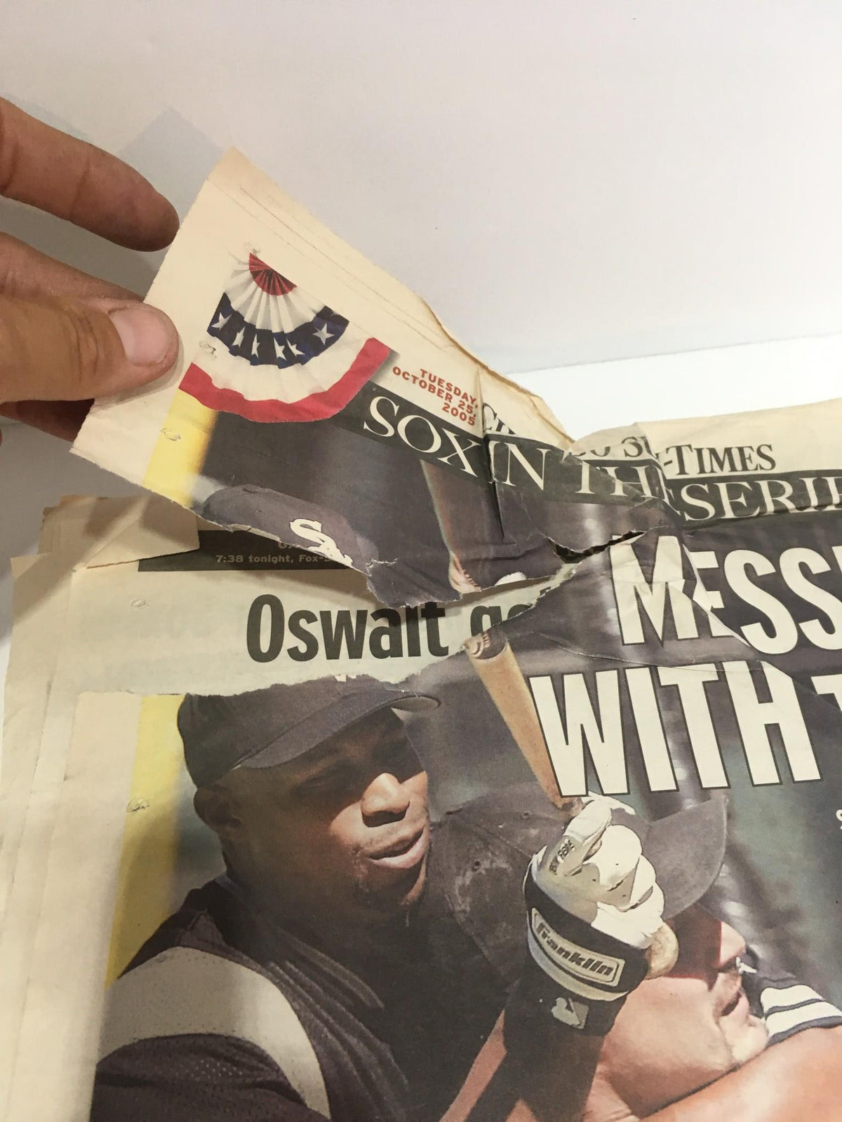 Chicago Sun-Times: Oct 25 2005 edition featuring 'Messin' With Texas,' showing a partially torn newspaper page highlighting a patriotic design.