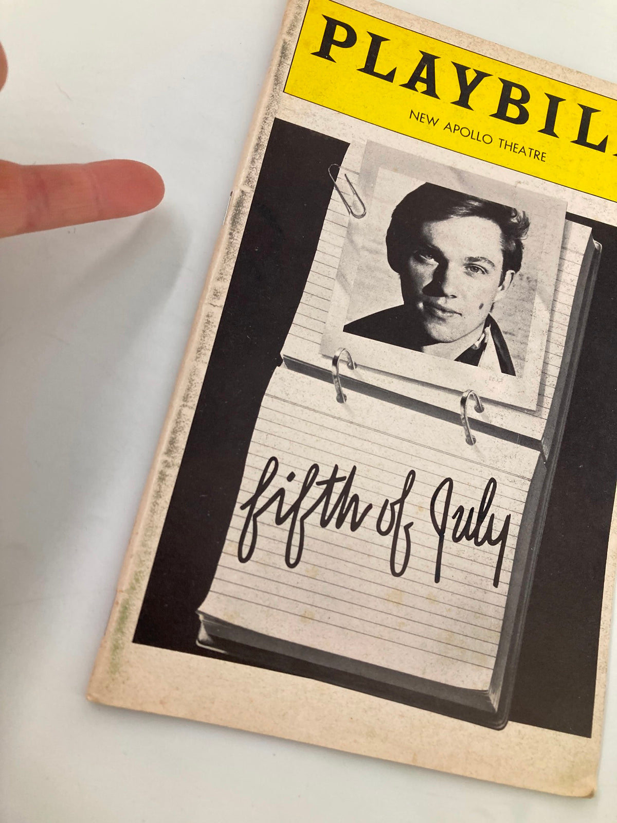 Close-up of the 1981 Playbill for 'Fifth of July' at New Apollo Theatre, highlighting the cover image of Richard Thomas.