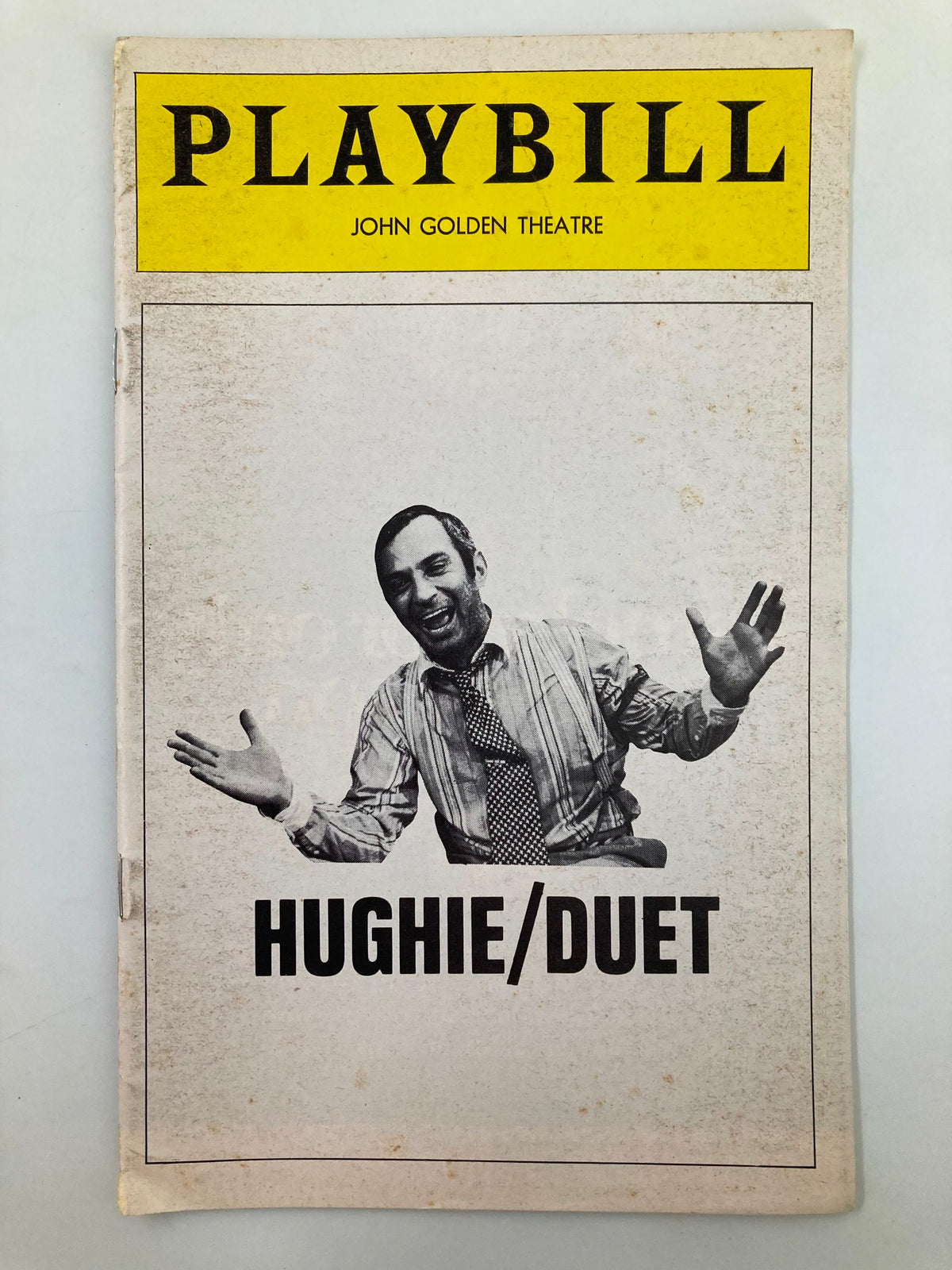 1975 Playbill for 'Hughie/Duet' at the John Golden Theatre featuring an image of a man with arms outstretched, likely a character from the play.