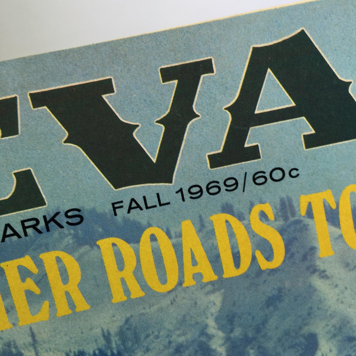 Close-up of the title from 'Nevada Highways and Parks Fall 1969 - The Other Roads To California Magazine' showcasing the vintage typography and publishing details.