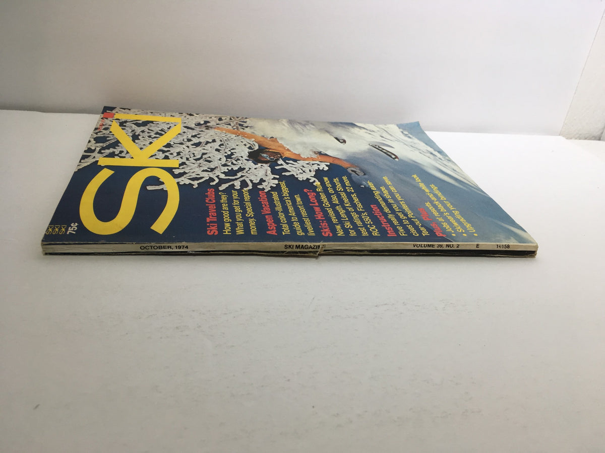 Side view of Ski Magazine October 1974 displaying its cover with ski travel themes and a price of 75 cents.