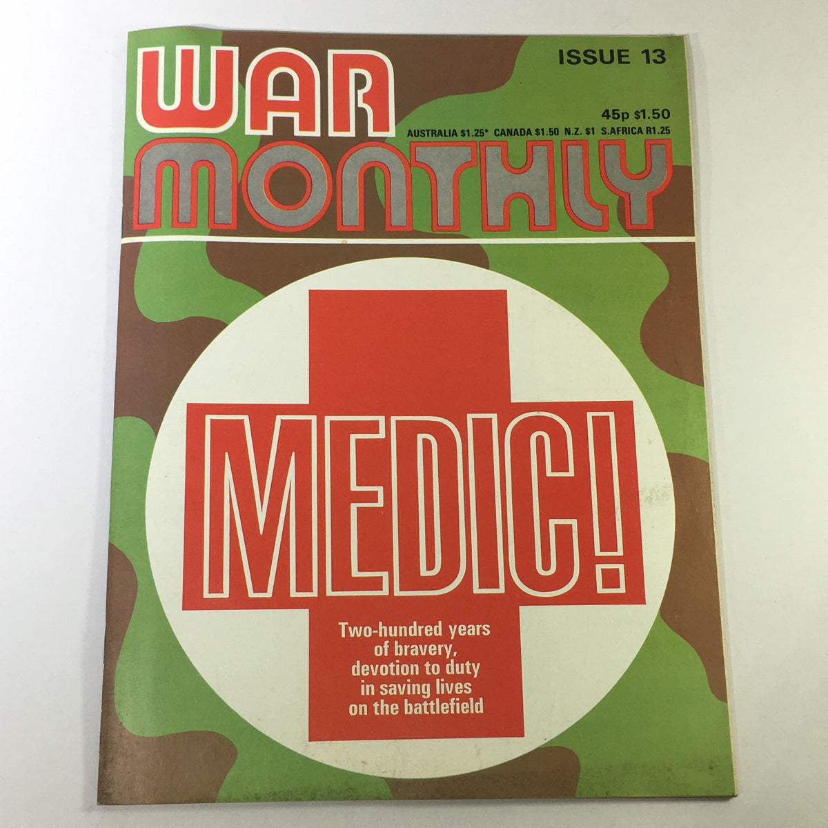 Cover of VTG War Monthly Magazine Issue 13 from April 1975, featuring bold lettering and a camouflage background, highlighting 'MEDIC!' and celebrating two hundred years of bravery in battlefield medical care.