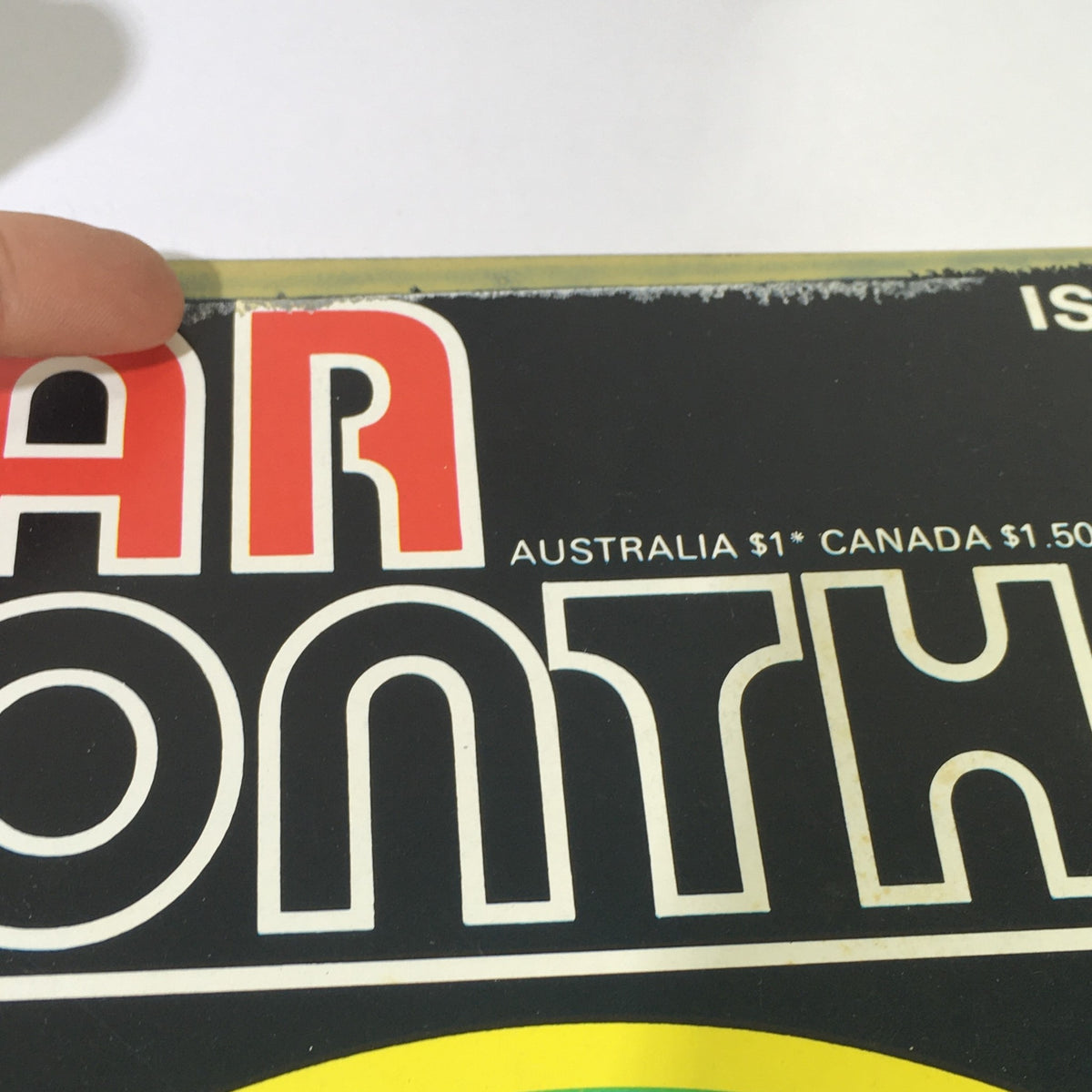 Close-up of the title 'War Monthly' on the cover of Issue 12 from March 1975, showcasing the magazine's vintage aesthetic and pricing information.