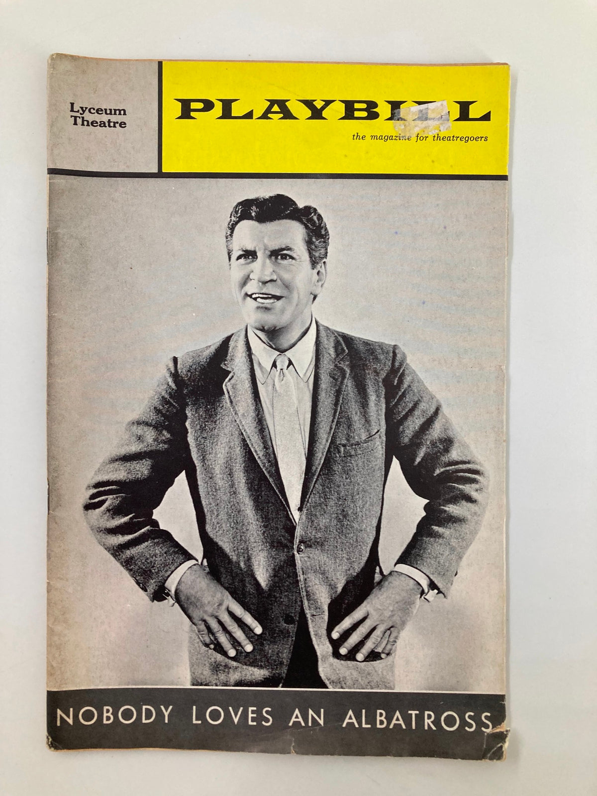 Vintage 1964 Playbill from the Lyceum Theatre featuring the production 'Nobody Loves An Albatross' with Robert Preston on the cover, showcasing dramatic design and classic theatre memorabilia.