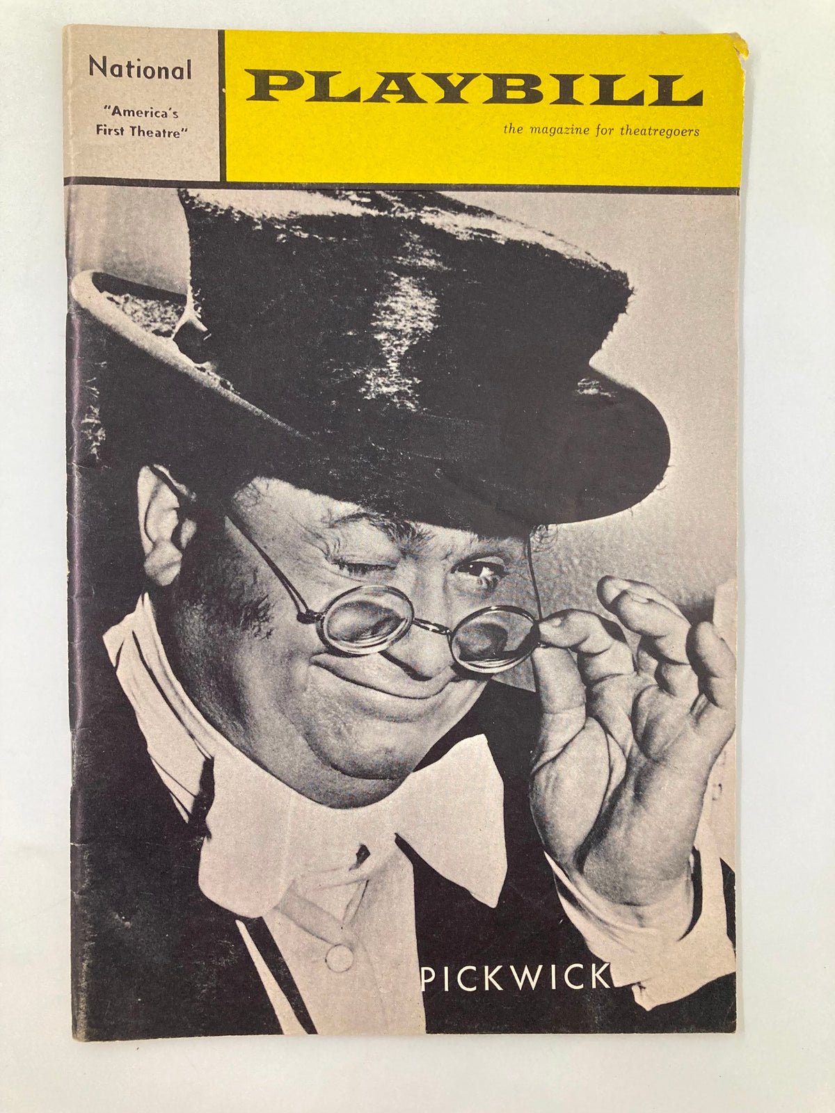 1965 Playbill National Theatre featuring Harry Secombe in the Victorian musical 'Pickwick', showcasing a black and white portrait of the performer with glasses, emphasizing the historical significance of this theatre memorabilia.