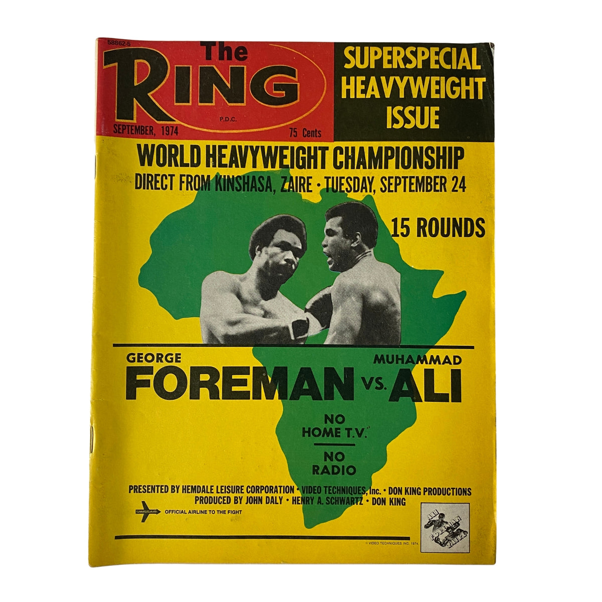 The Ring Magazine cover from September 1974 featuring George Foreman vs Muhammad Ali. This issue highlights the World Heavyweight Championship and is recognized as a historic prelude to the 'Rumble in the Jungle'.