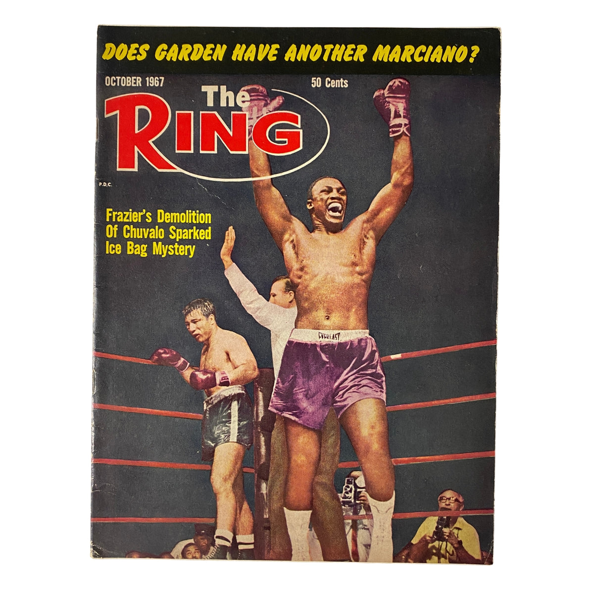 The Ring Magazine October 1967 featuring Joe Frazier victorious on the cover, highlighting Frazier's win against George Chuvalo. A vintage boxing publication in very good condition.