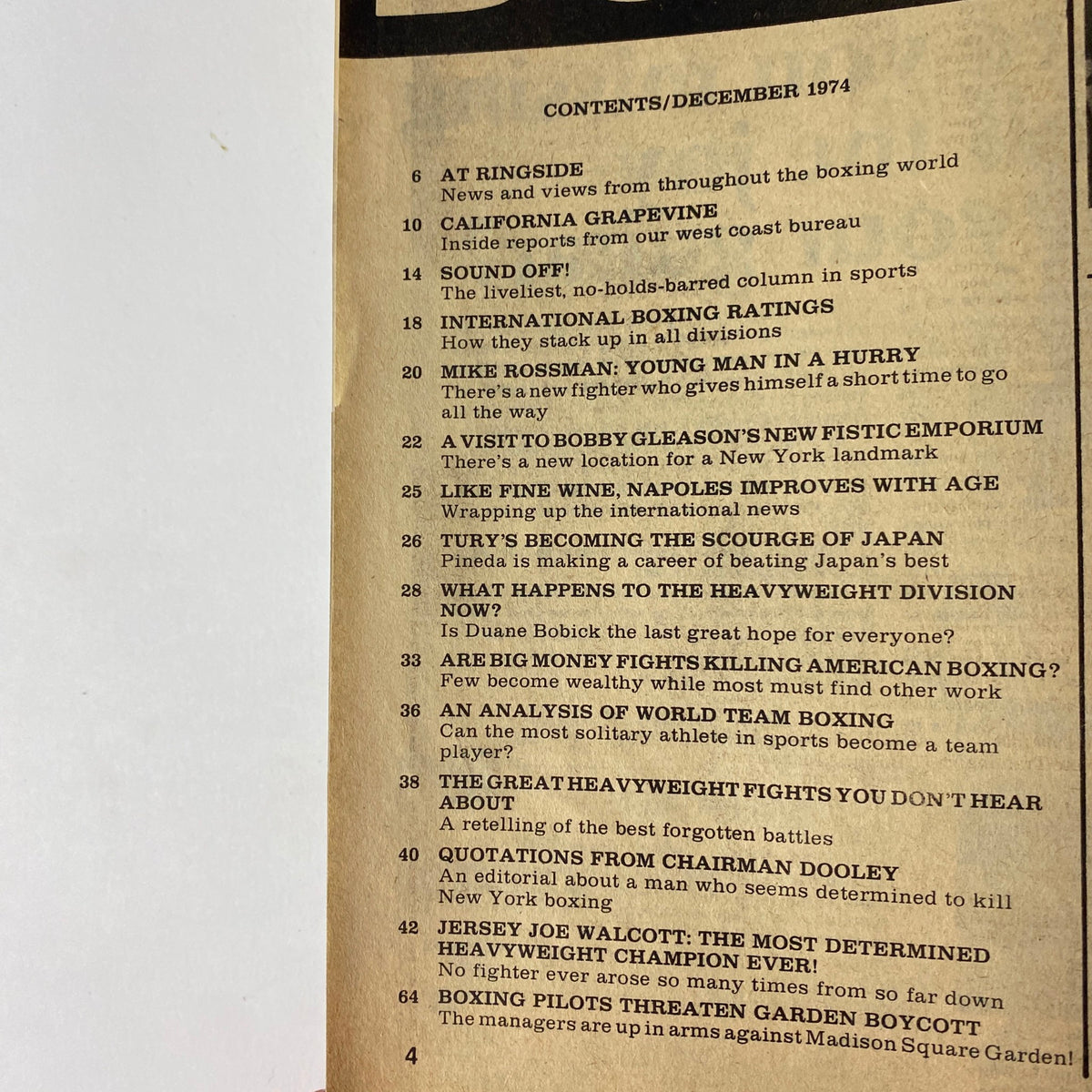 Contents page of International Boxing Magazine December 1974, listing articles such as 'Mike Rossman: Young Man in a Hurry' and 'Like Fine Wine, Nápoles Improves With Age' along with features on heavyweight boxing and industry insights.